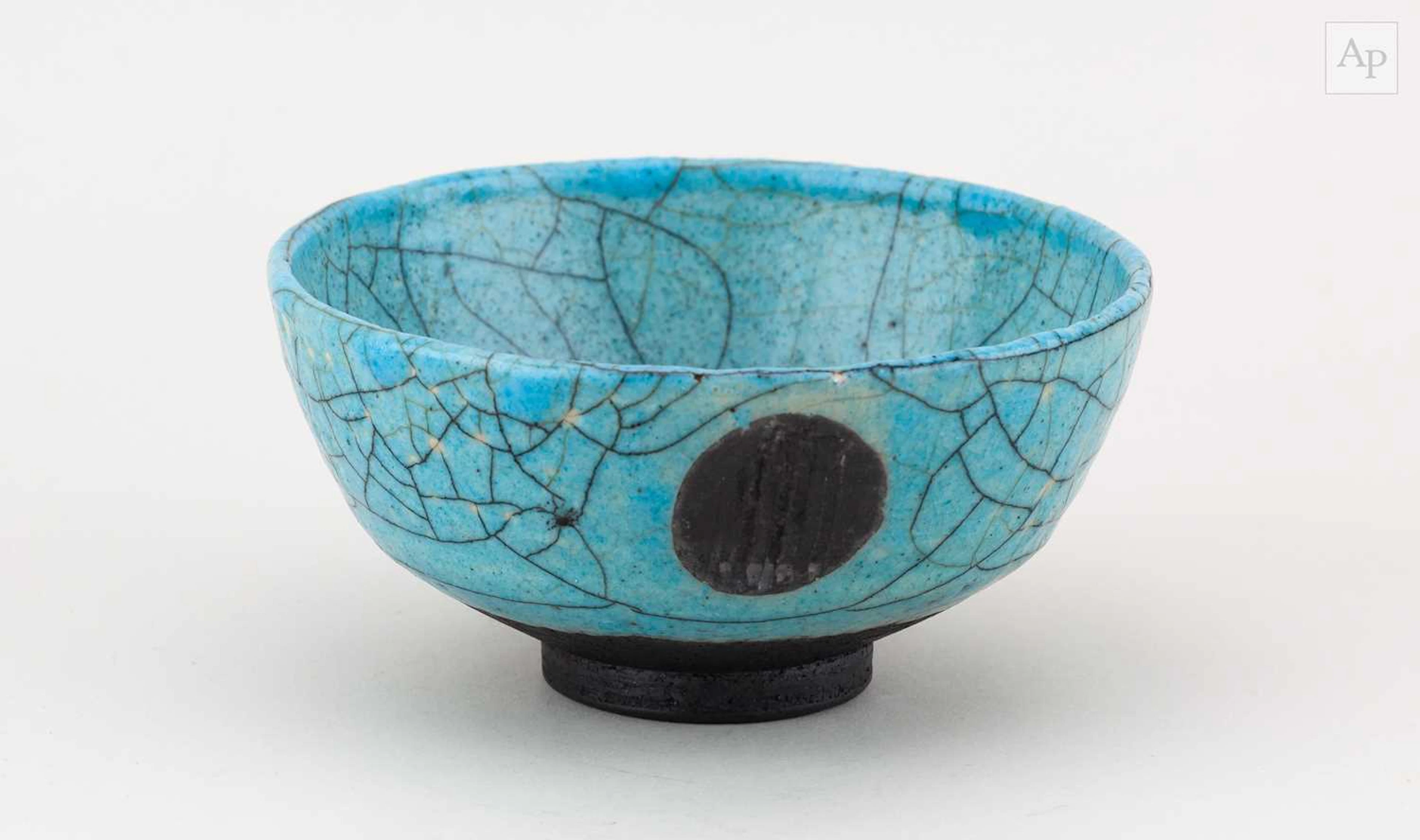 SIMON LEACH (born 1956); a small raku bowl covered in...
