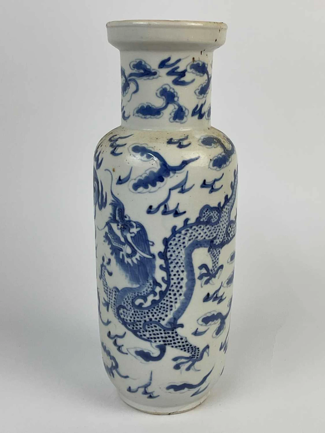 A Chinese blue and white porcelain vase decorated with dragon and clouds