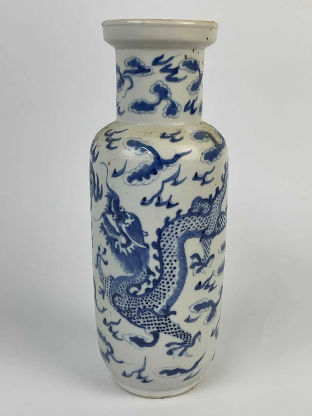 A Chinese blue and white porcelain vase decorated with dragon and clouds