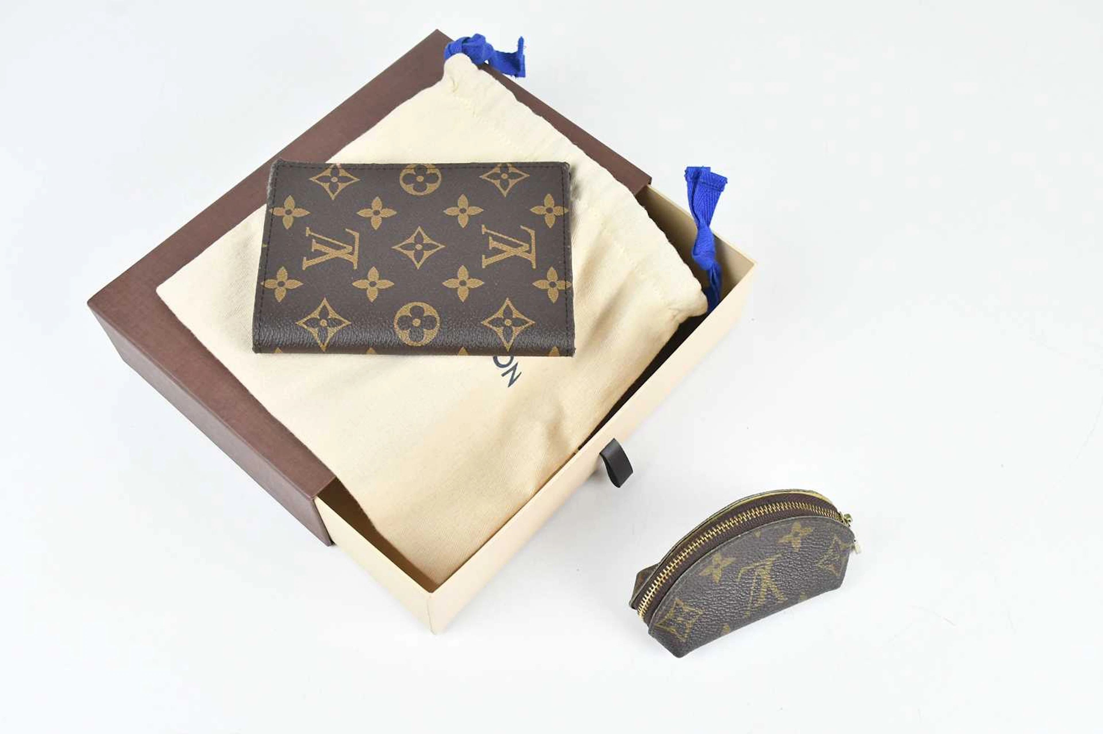 LOUIS VUITTON; a brown and tan monogram coated canvas...
