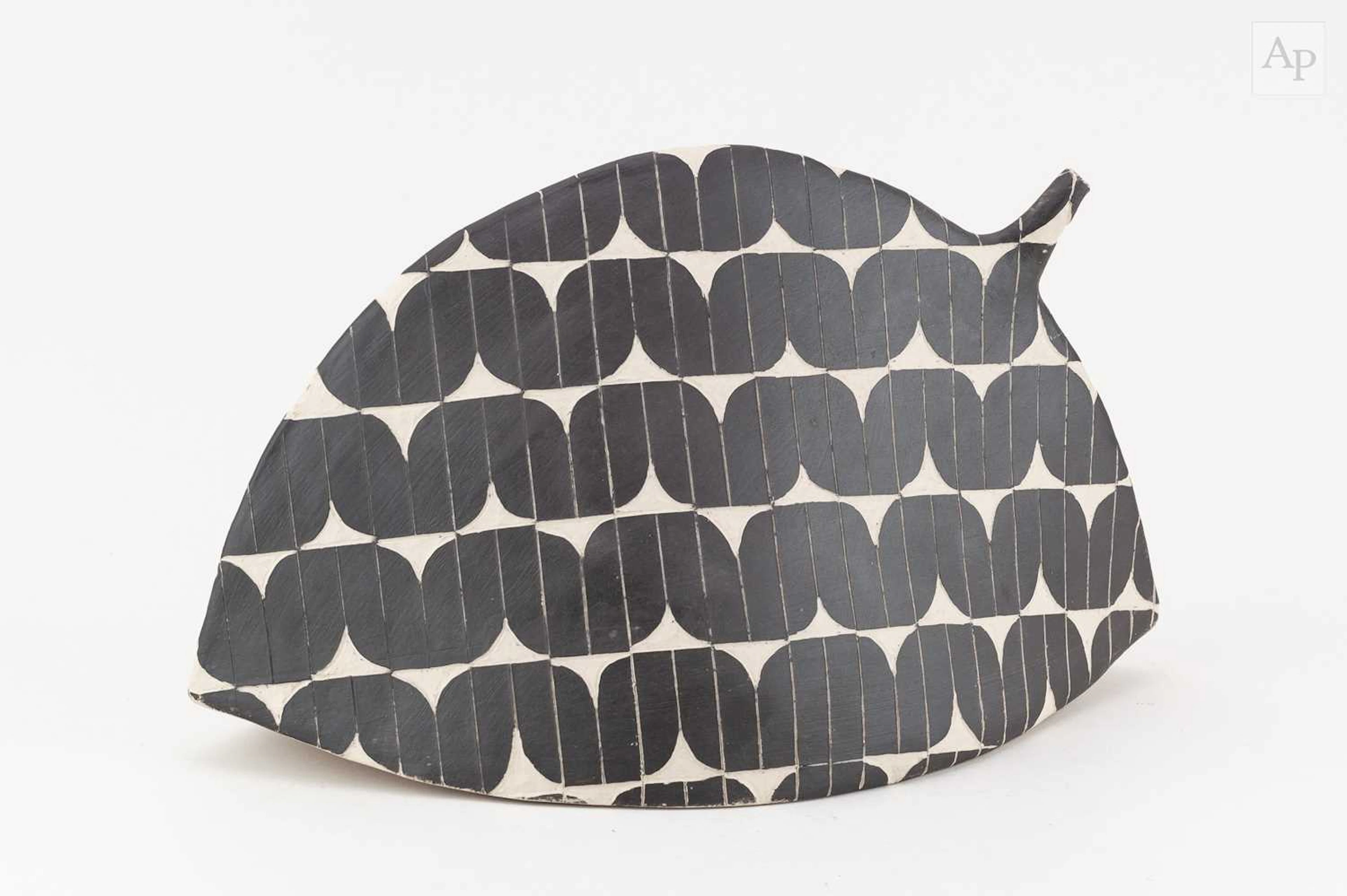 BJORK HARALDSDOTTIR; a white stoneware sculptural form decorated with black slip