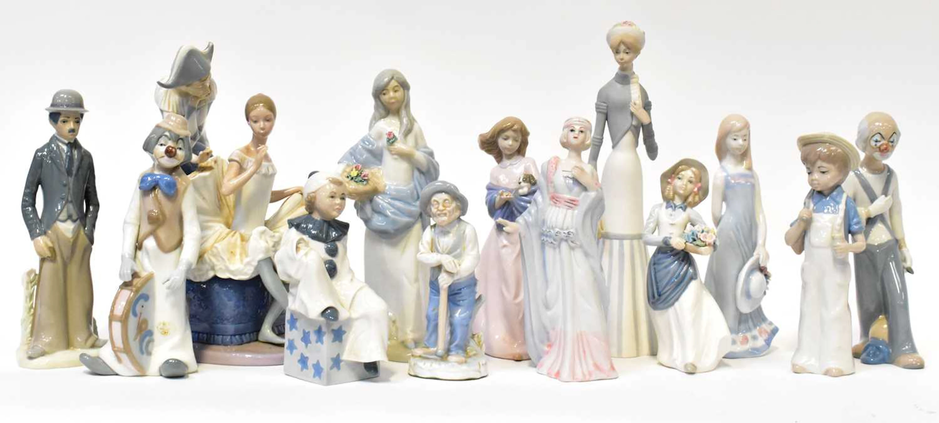A collection of NAO and other Spanish porcelain figures