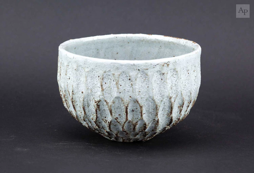 AKIKO HIRAI (born 1970); a small stoneware bowl covered...