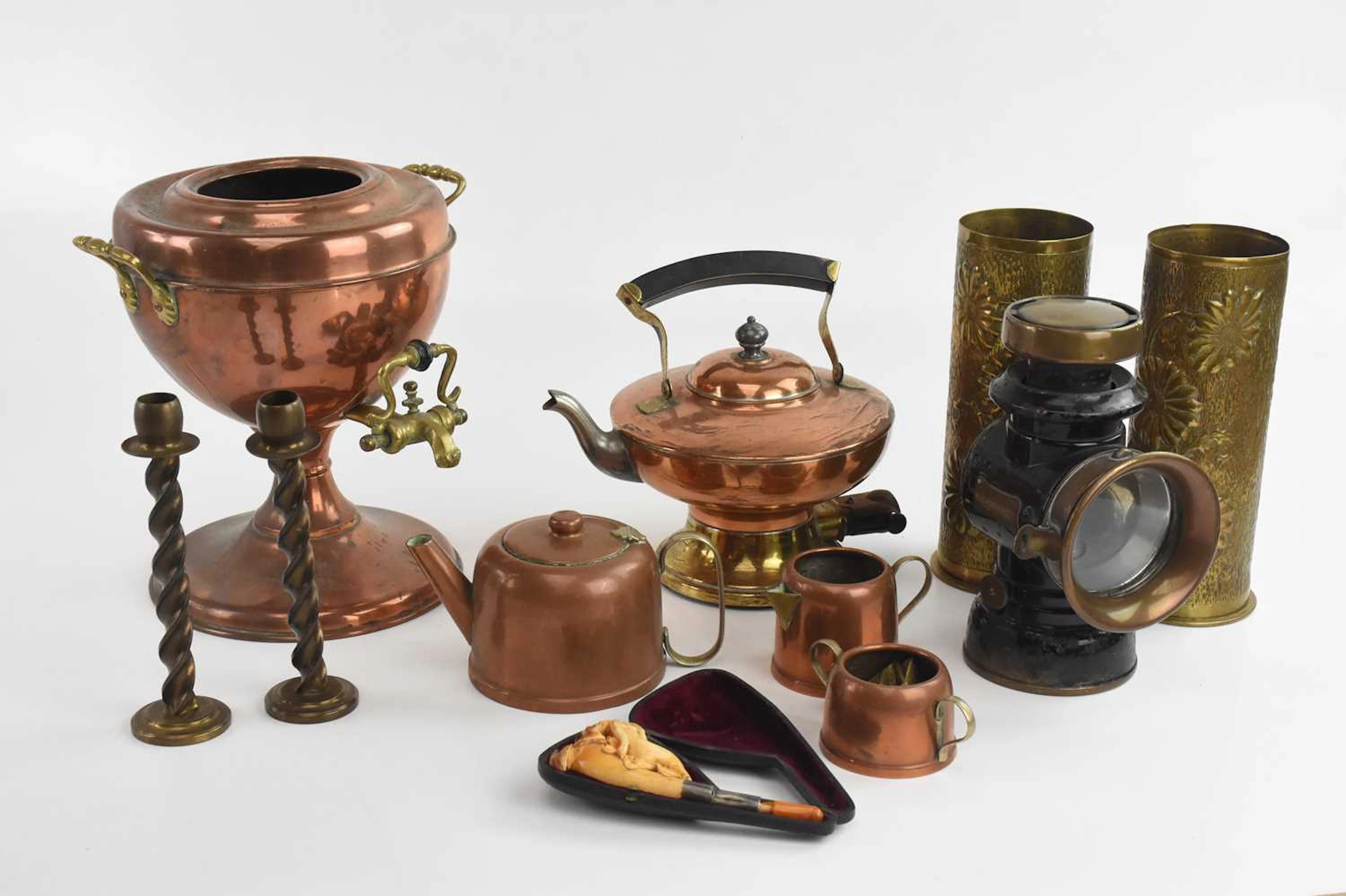 A collection of assorted metalware including trench art shell casings