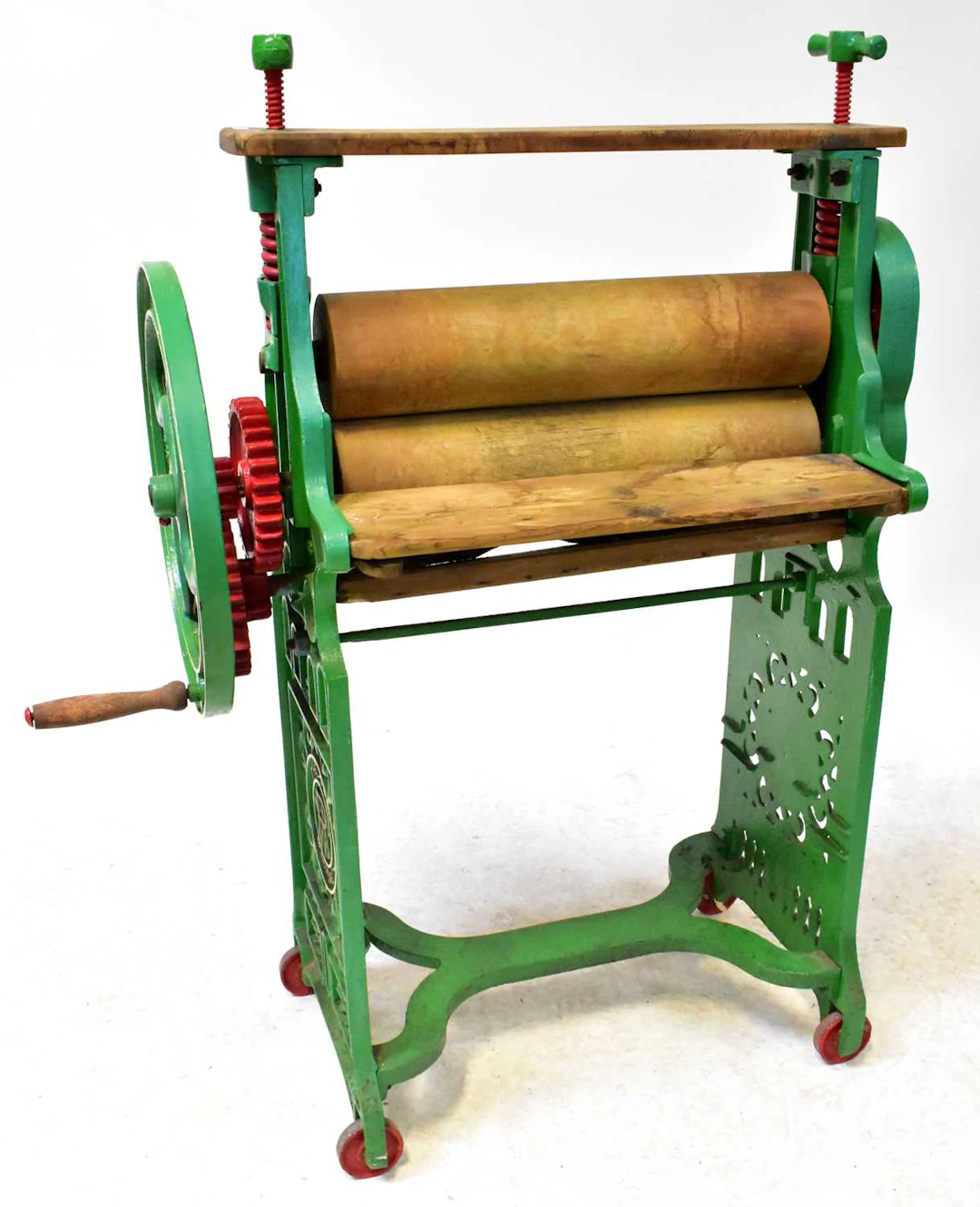 A vintage mangle stamped the 'Swan Machine'