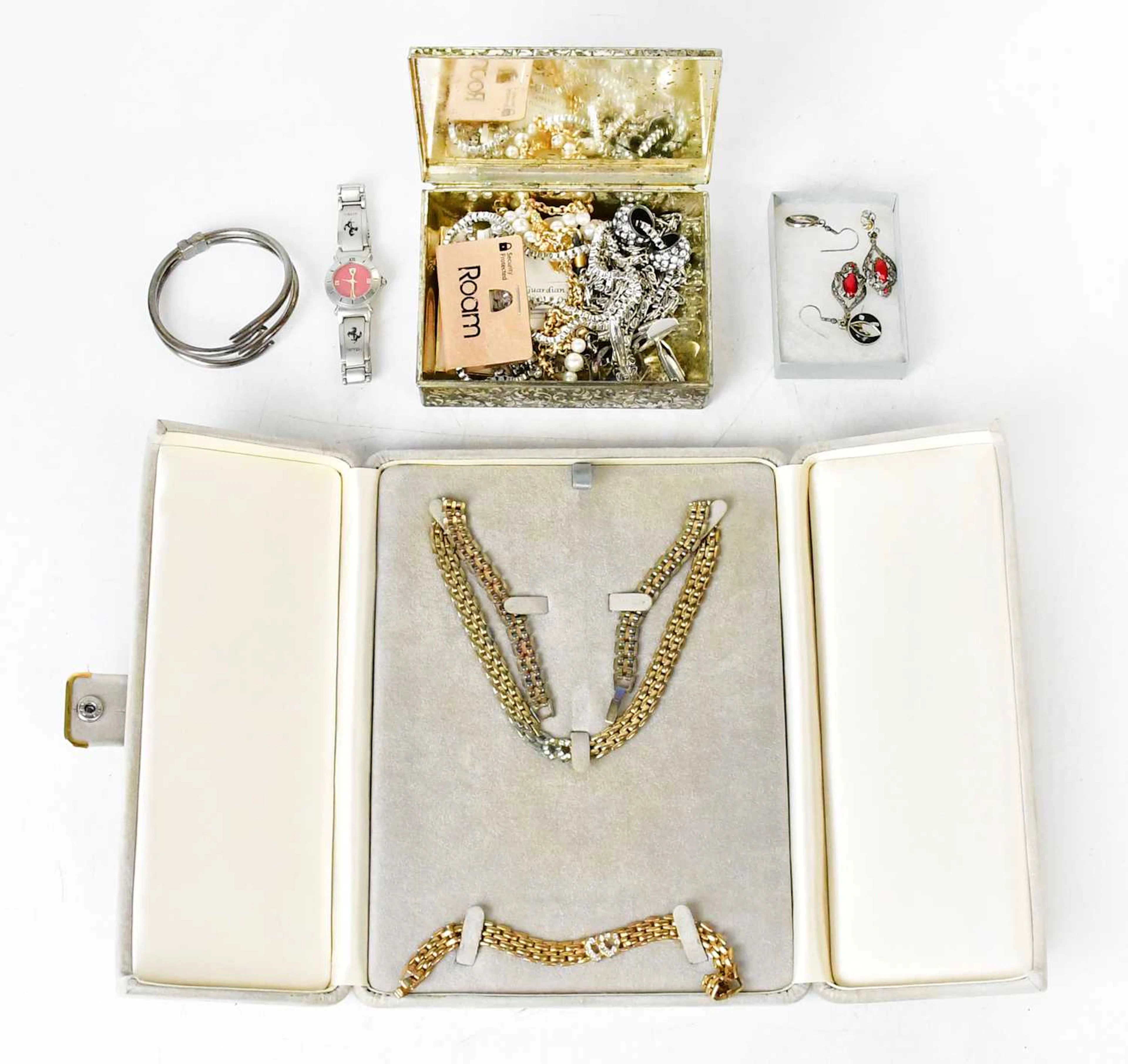 A small collection of costume jewellery including necklaces