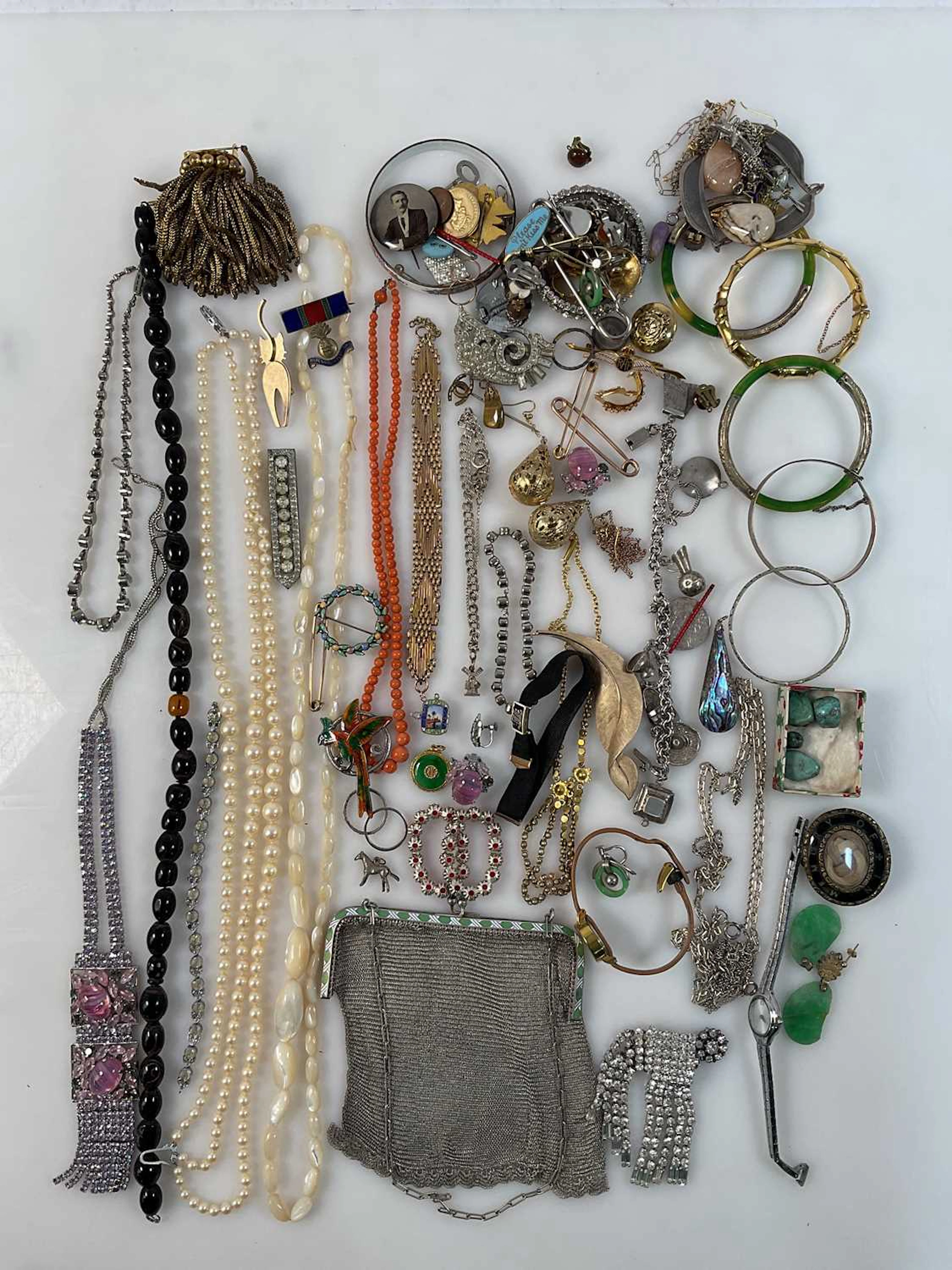A quantity of silver and silver plated dress jewellery...