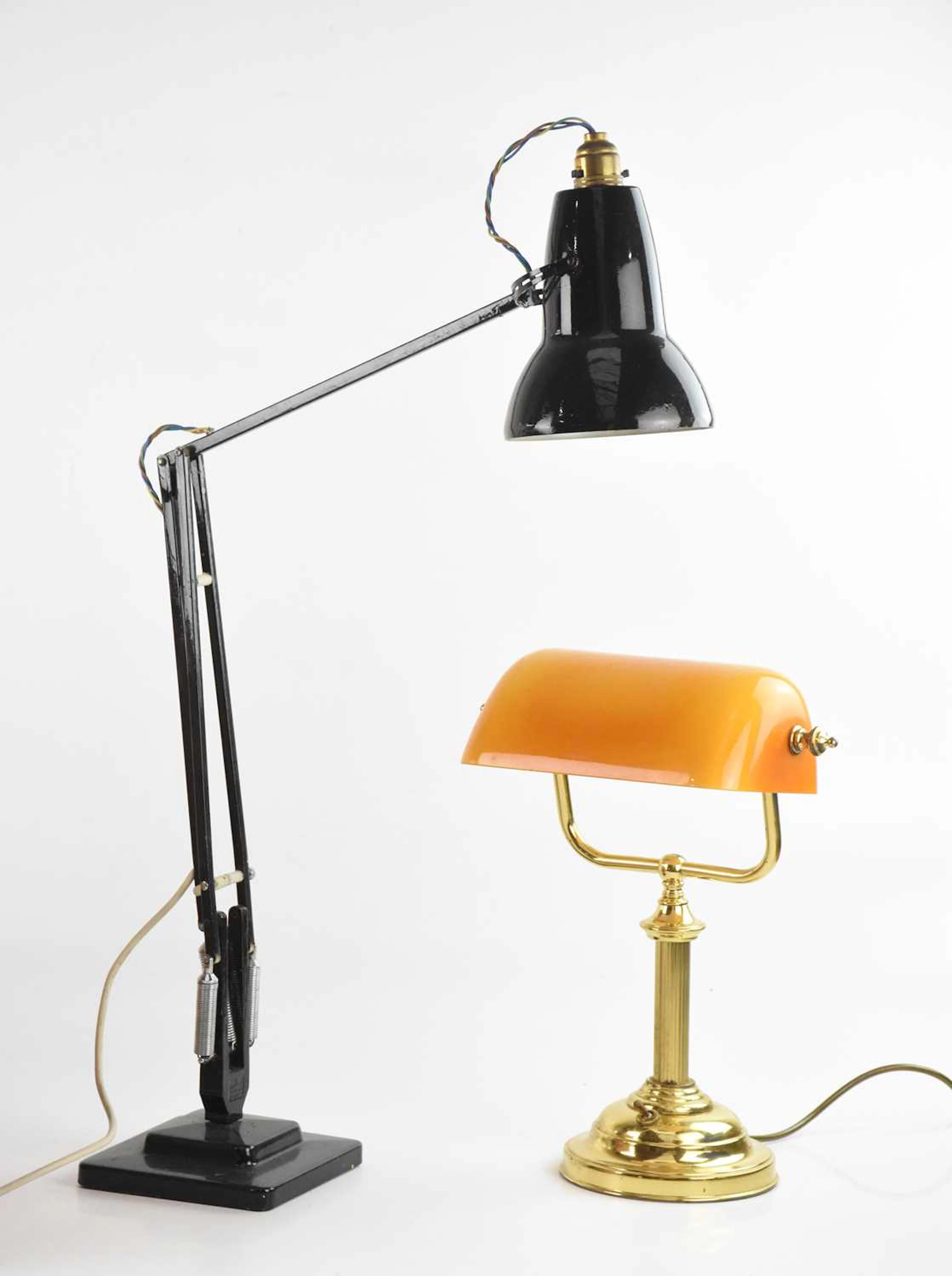 A black painted metal Anglepoise type lamp