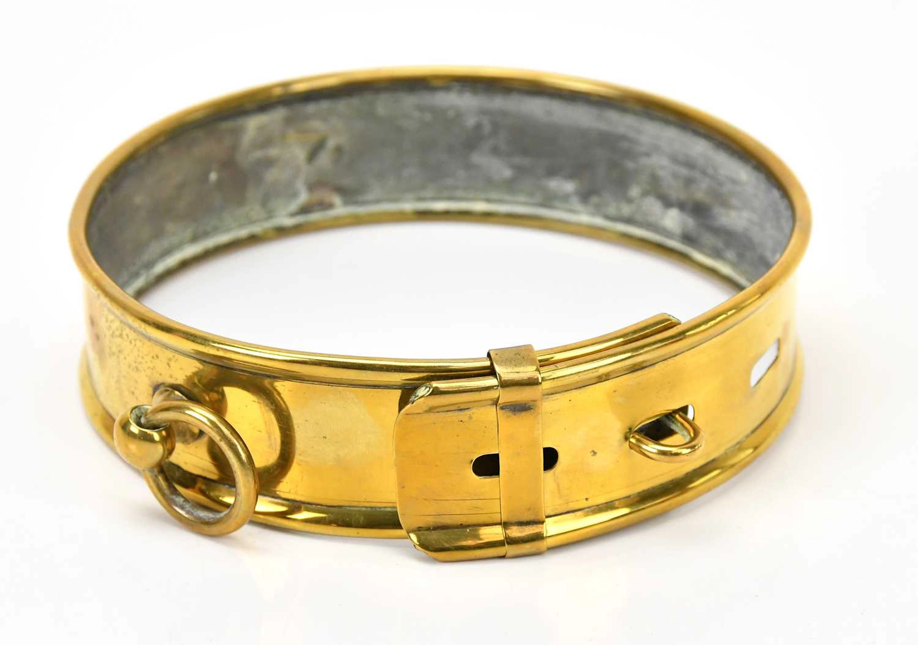 A 19th century brass dog collar