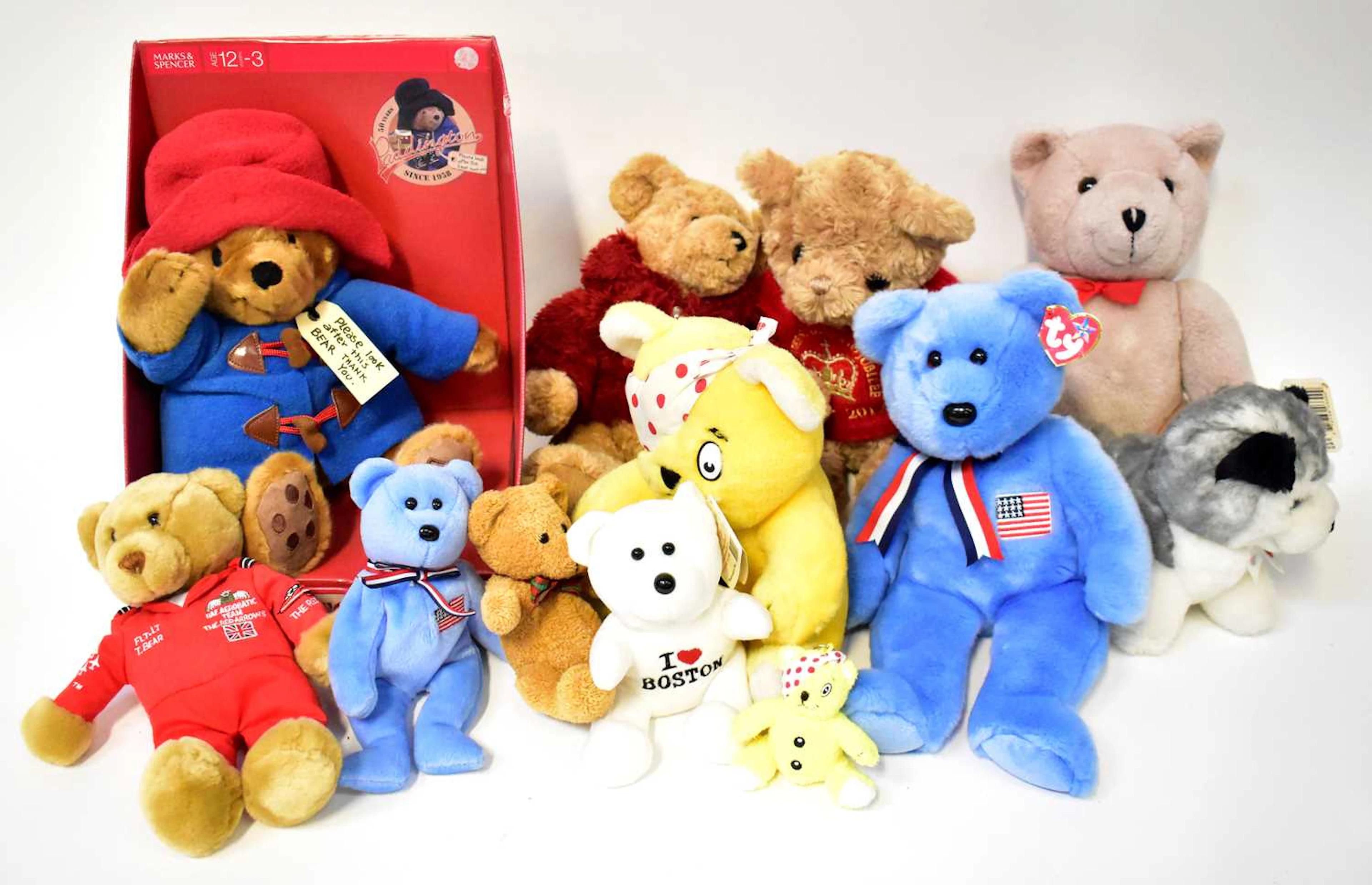 A quantity of plush toys to include a Marks & Spencer Paddington Bear