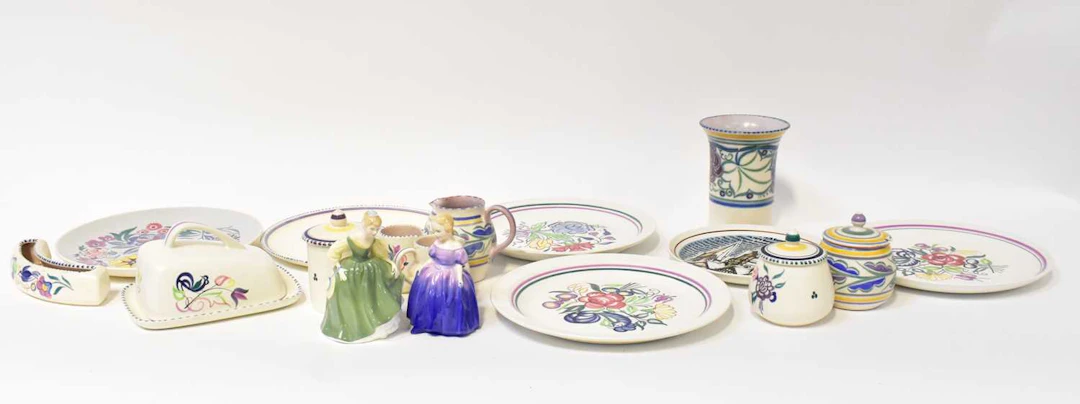 A group of Poole Pottery items including a vase