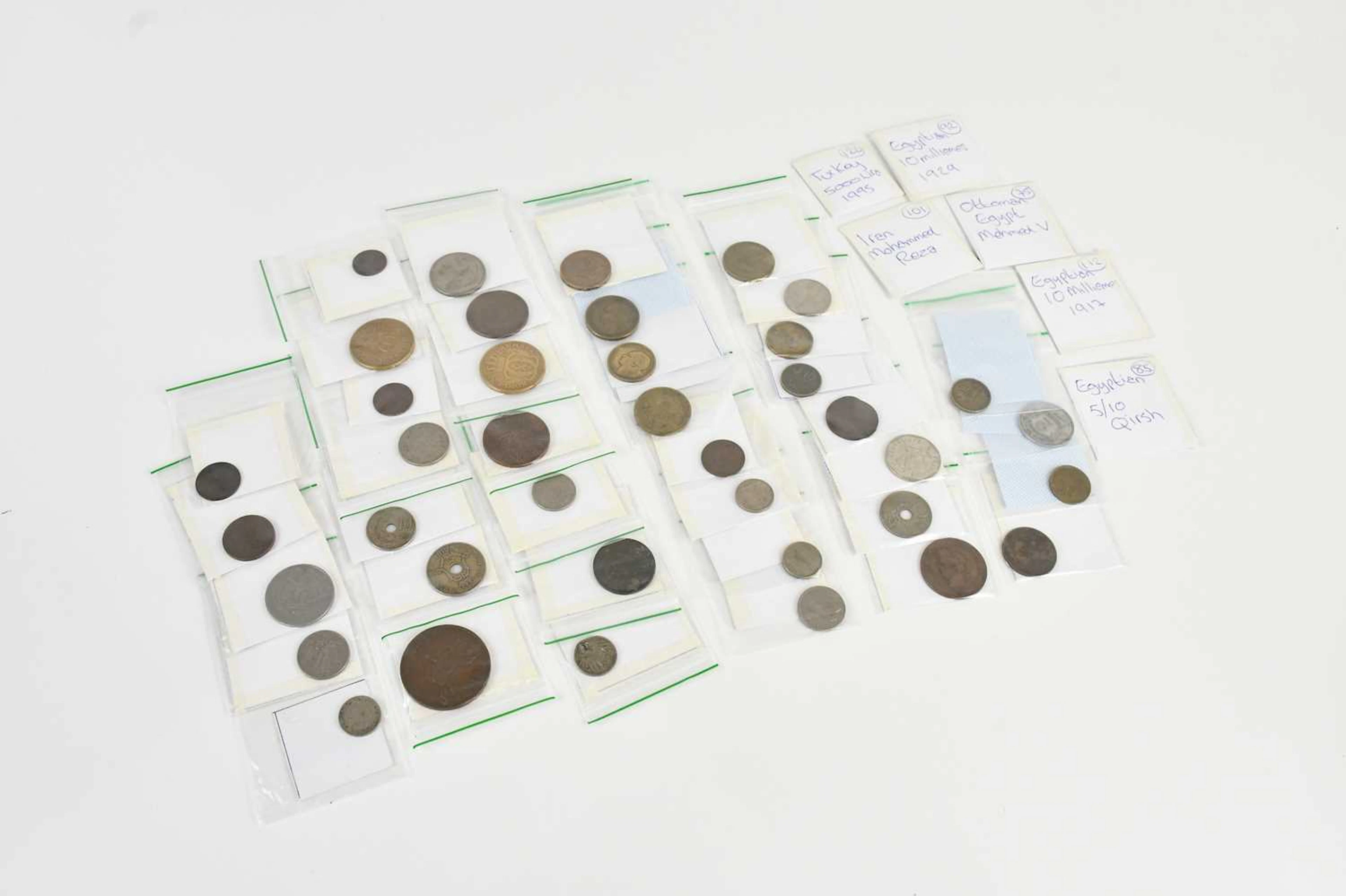 A collection of mixed foreign coins comprising of Switzerland