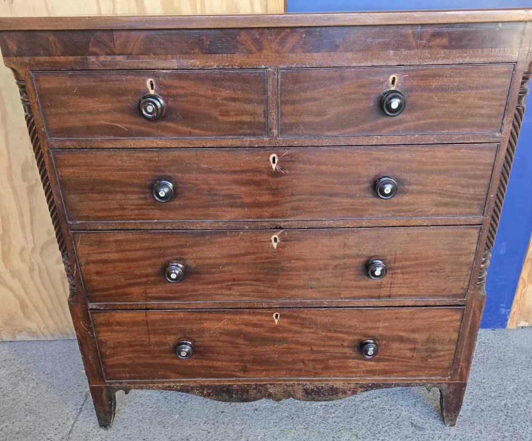 A 19th century mahogany chest of two small over four graduated long drawers