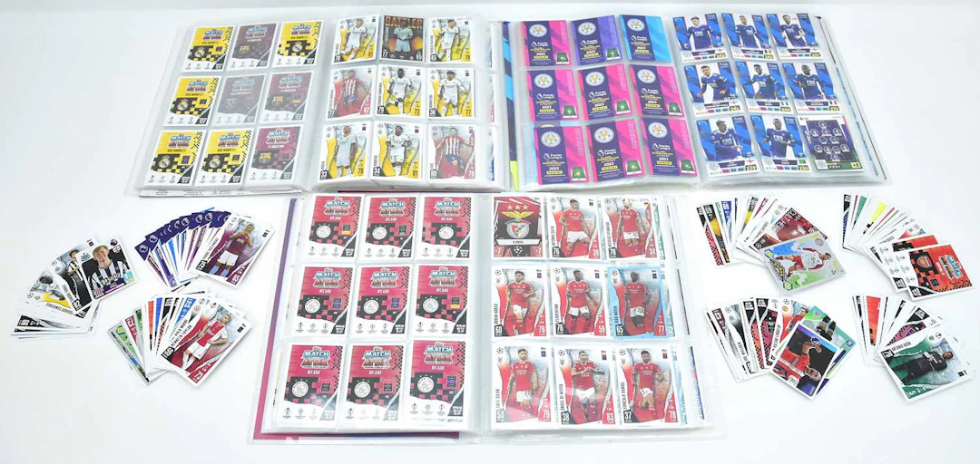 Three albums of season 2023/24 football collectors' cards