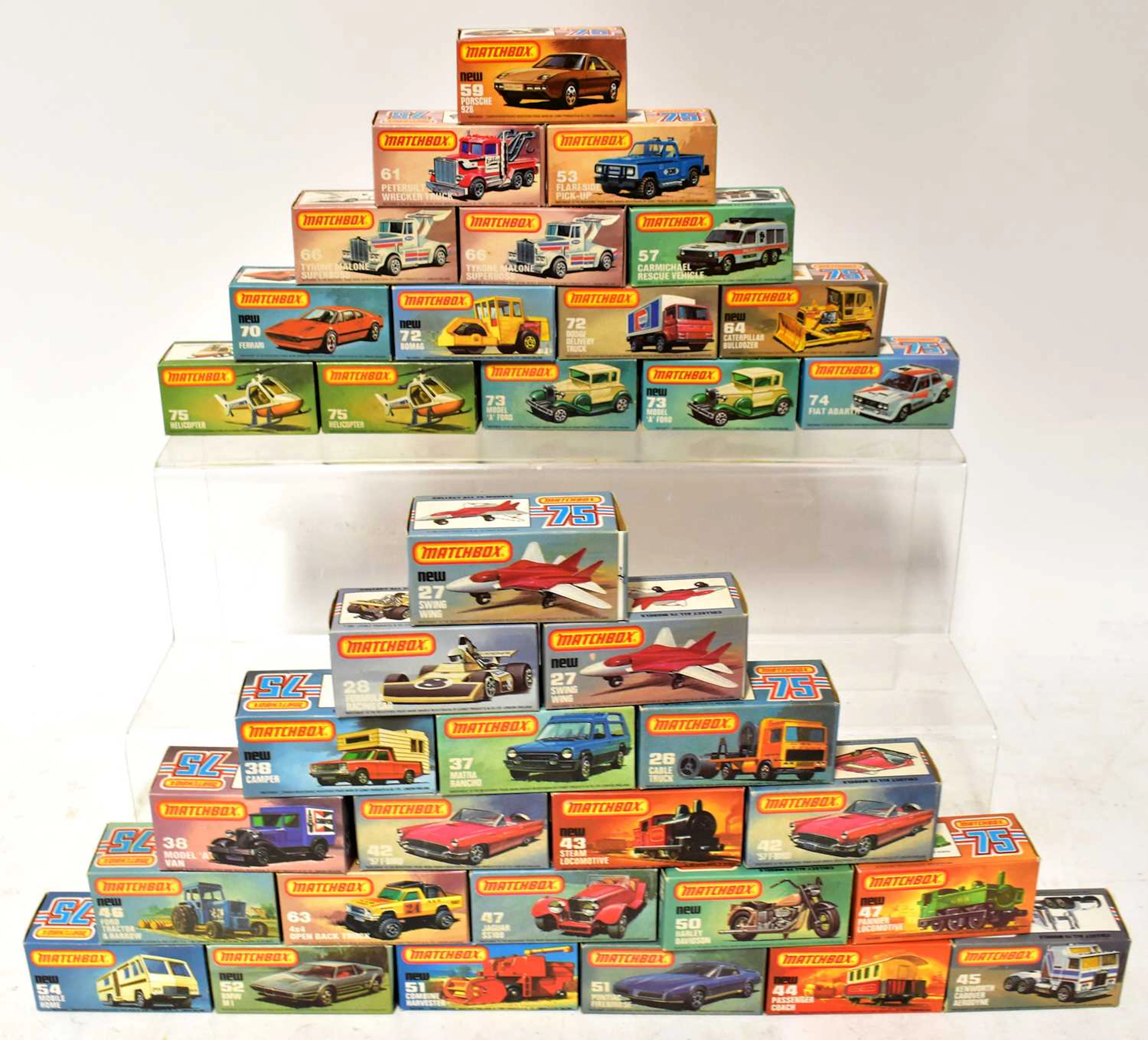 MATCHBOX; fifty-two '75 boxed diecast vehicles
