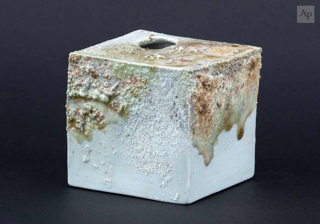 AKIKO HIRAI (born 1970); a porcelain flower brick with...