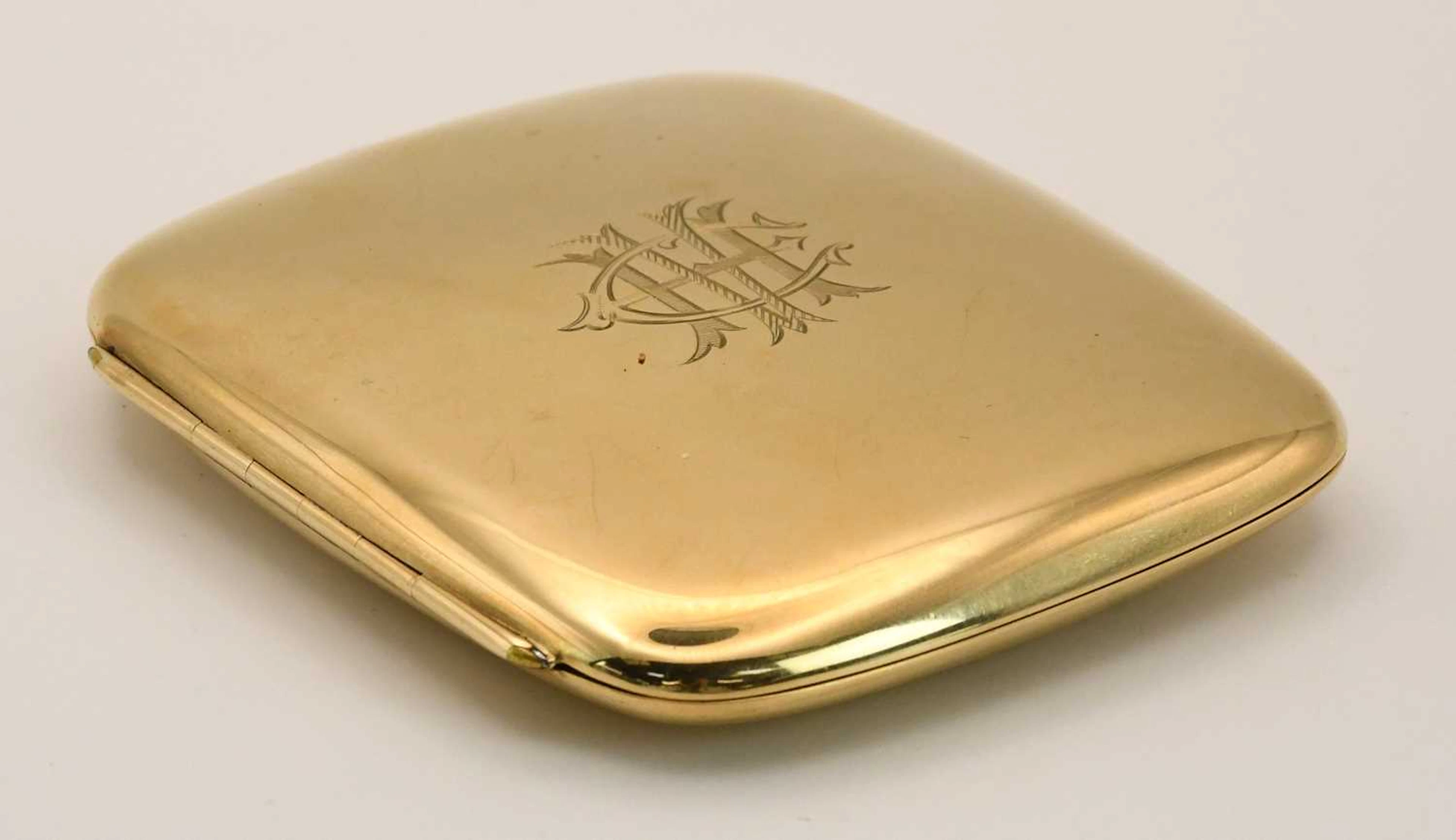 A 9ct yellow gold breast pocket cigarette case
