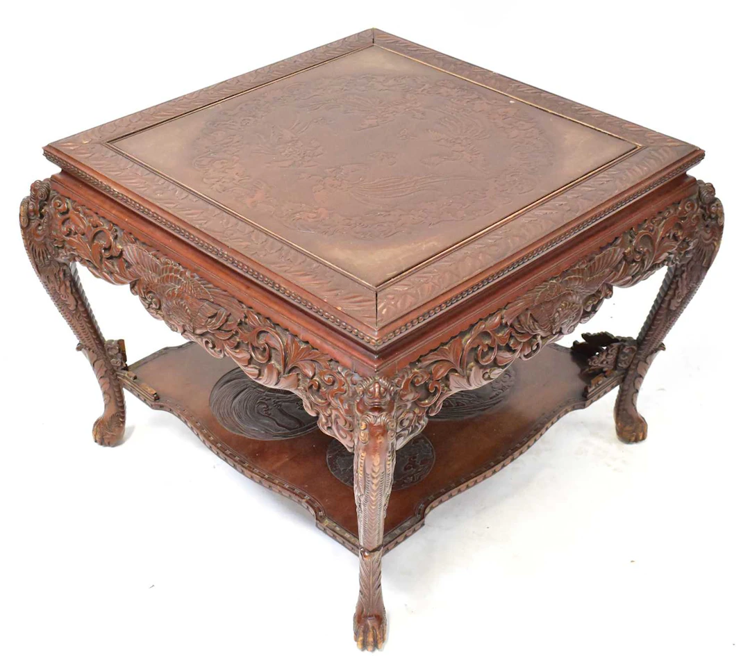 A late 19th/early 20th century Japanese carved two-tier occasional table