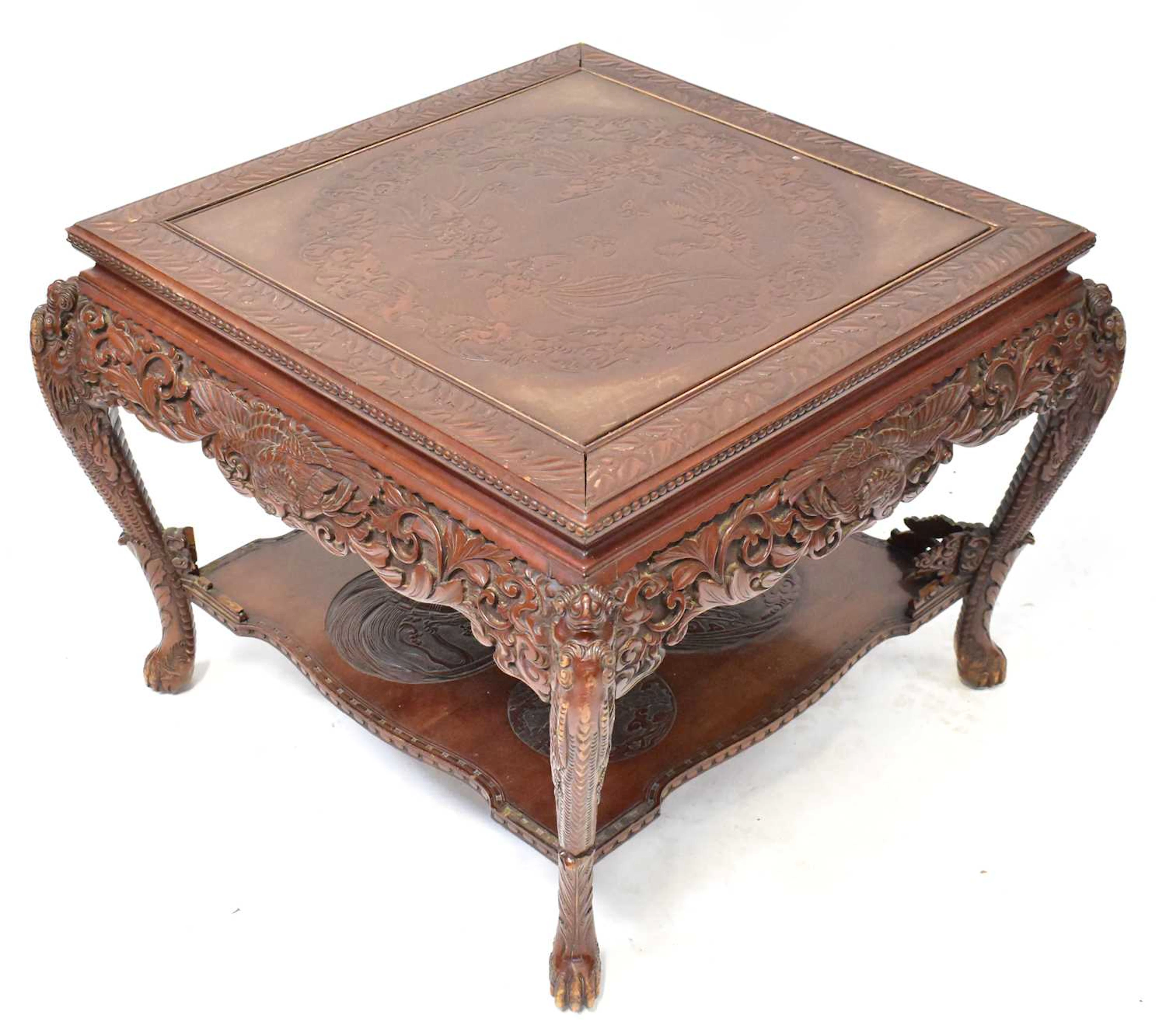 A late 19th/early 20th century Japanese carved two-tier occasional table