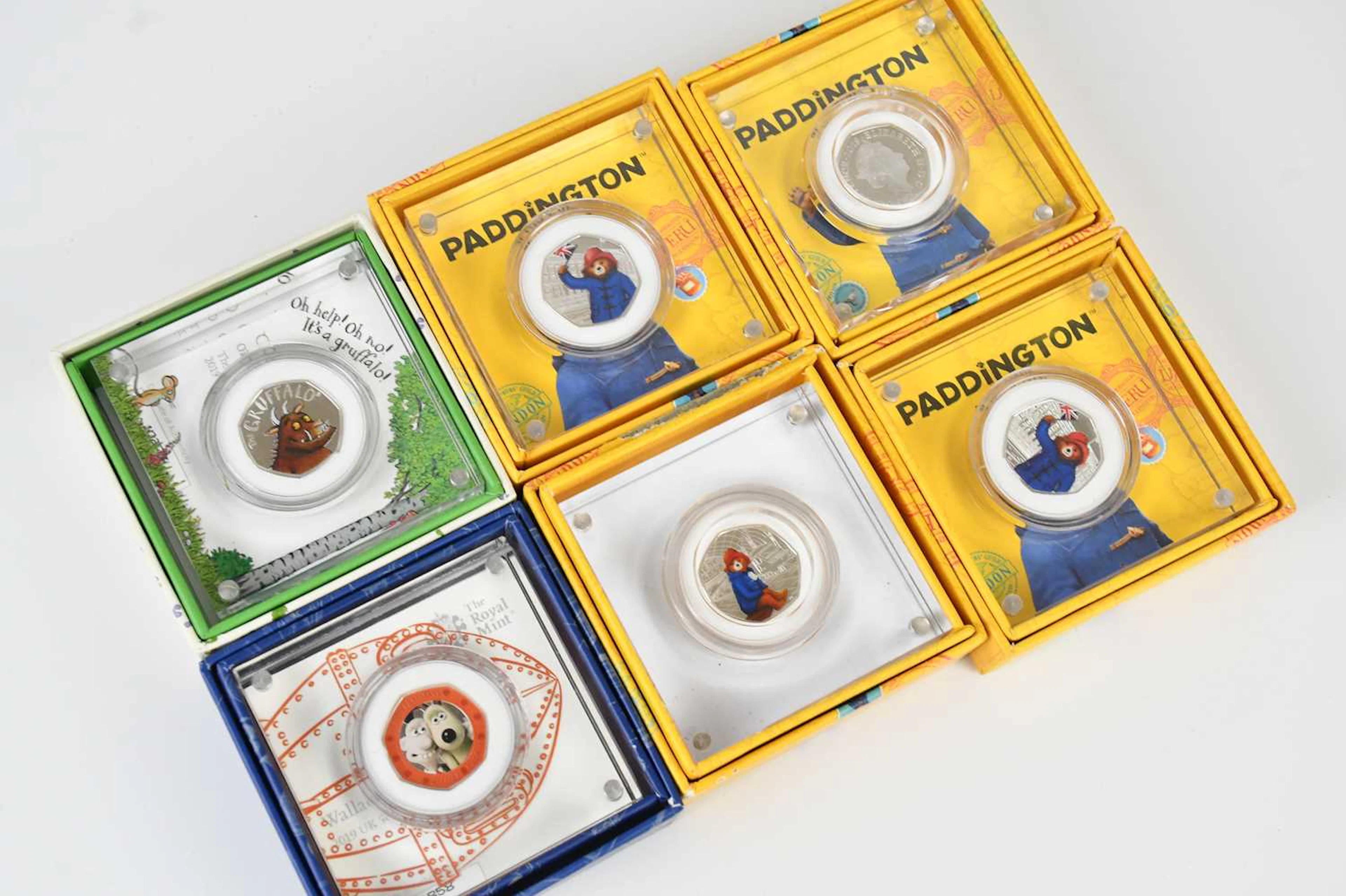 THE ROYAL MINT; four Paddington Bear 2018 silver proof 50p coins
