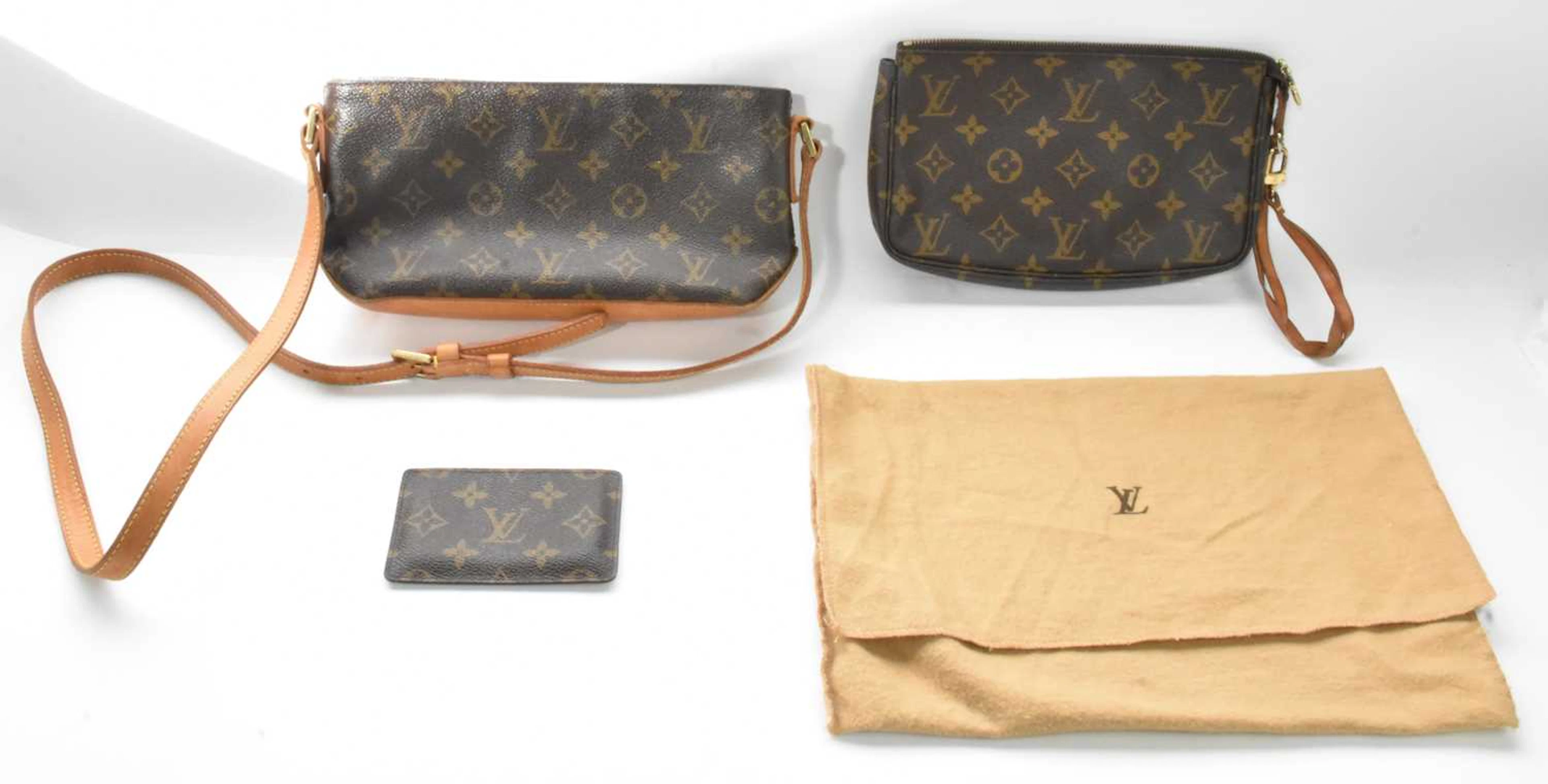 LOUIS VUITTON; a vintage brown monogram leather clutch bag
