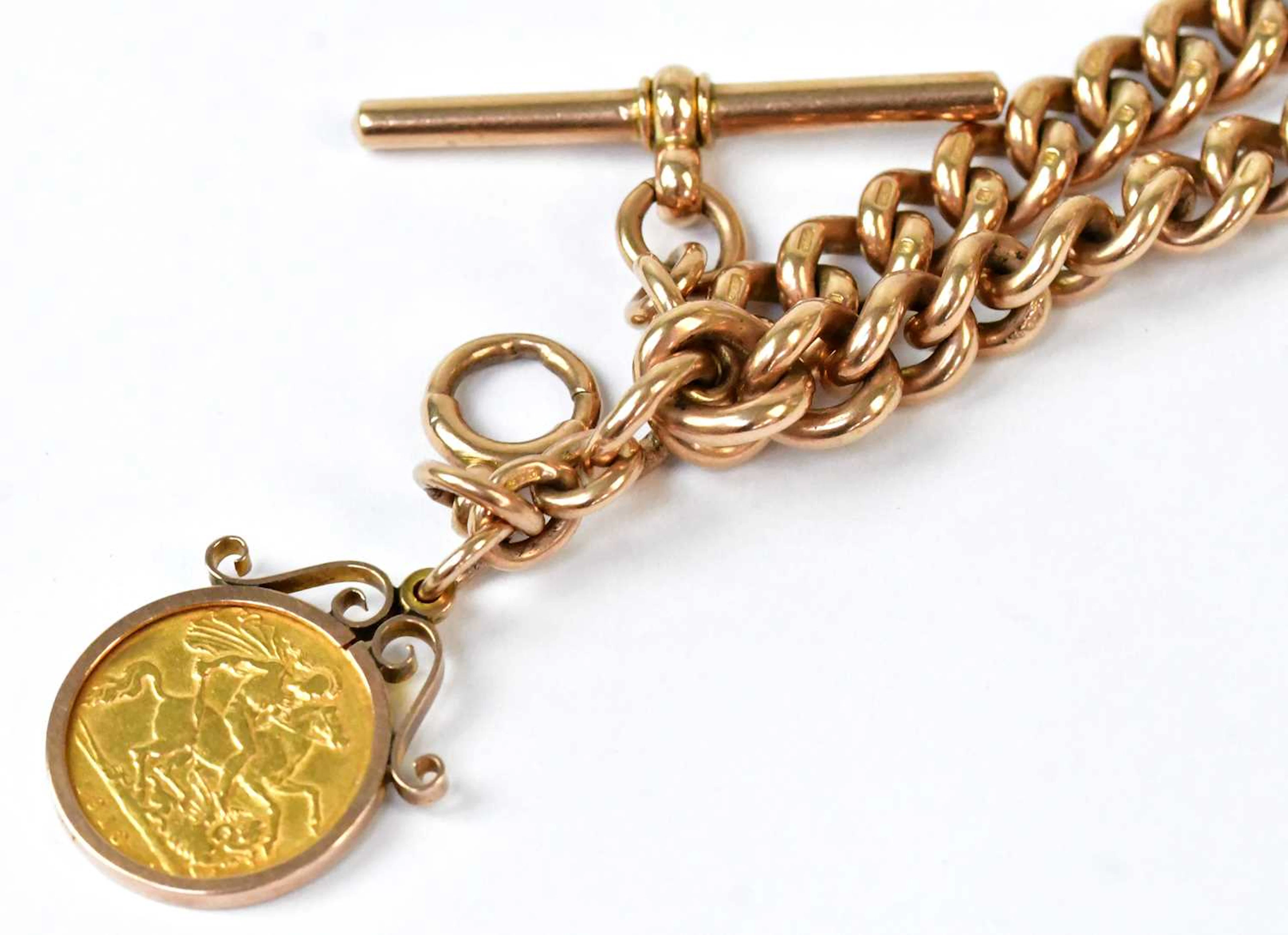 A 9ct yellow gold double Albert watch chain