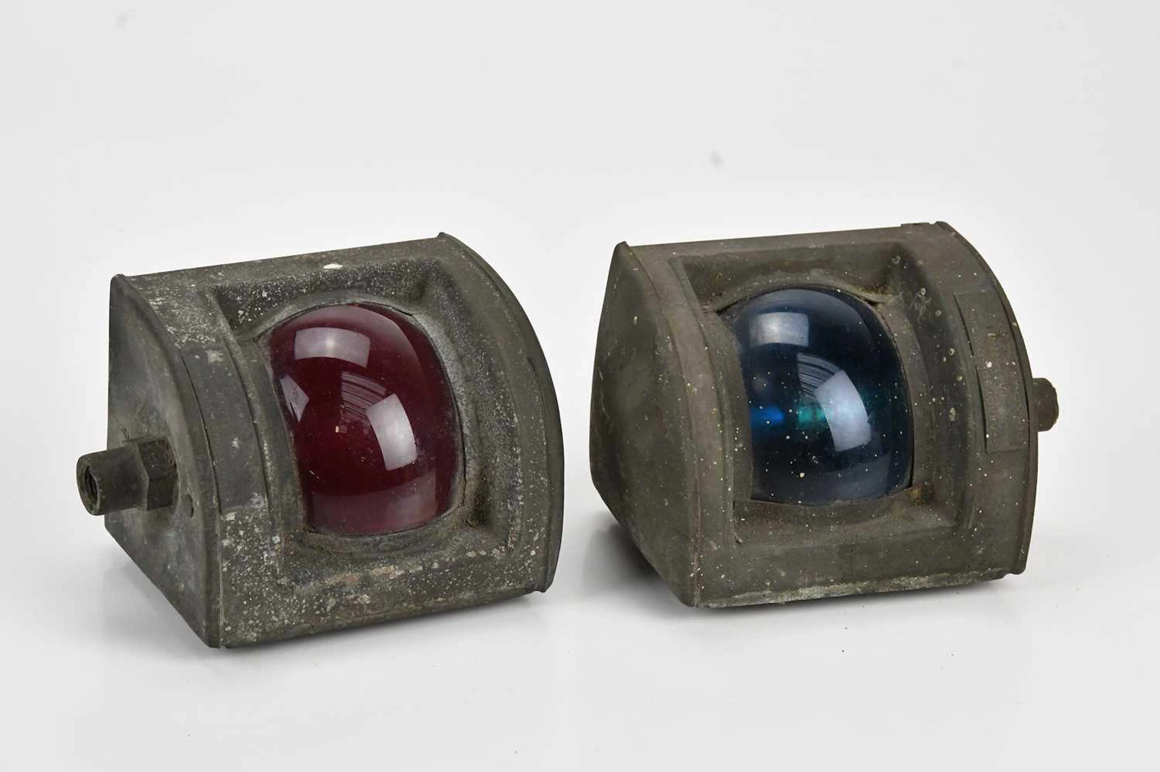 A pair of vintage copper port and starboard bow lamps