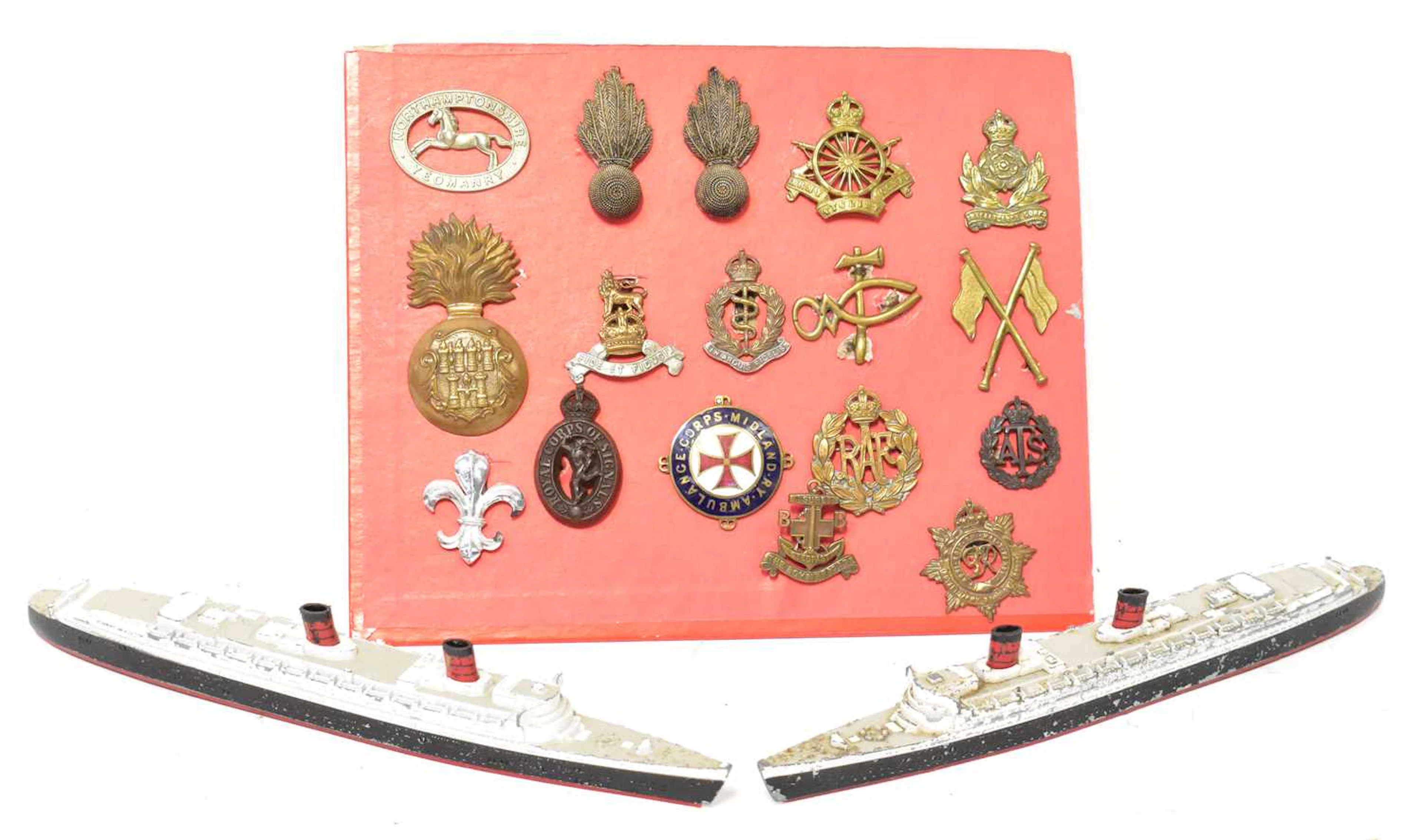 A collection of military cap badges