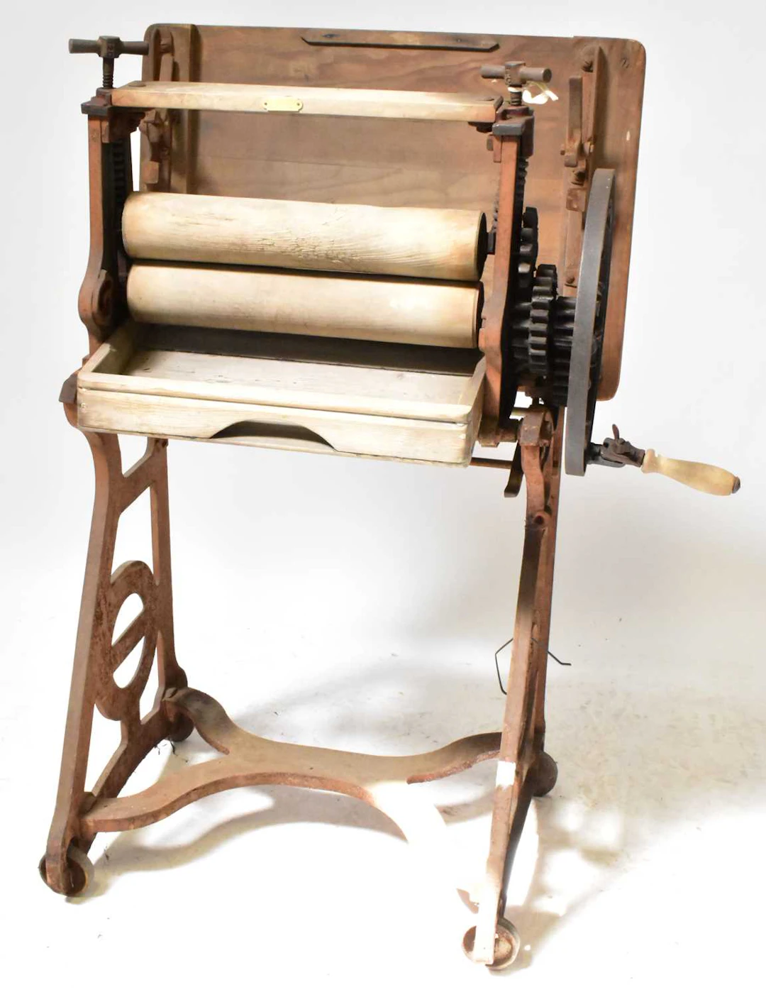 A Lewis's Ltd cast iron mangle with wheel stamped 'G.454'...