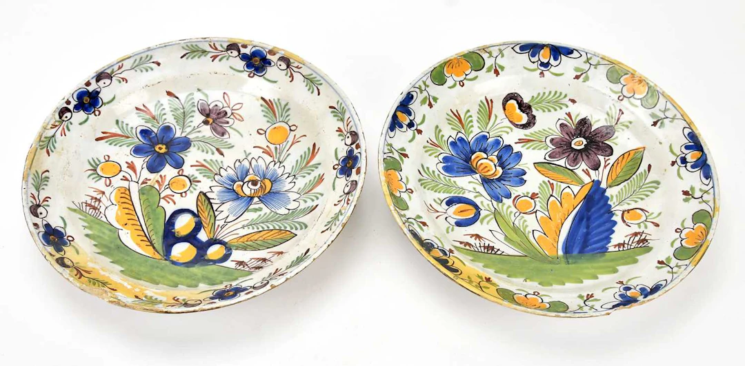 Two 18th century Delft polychrome tin glazed earthenware...