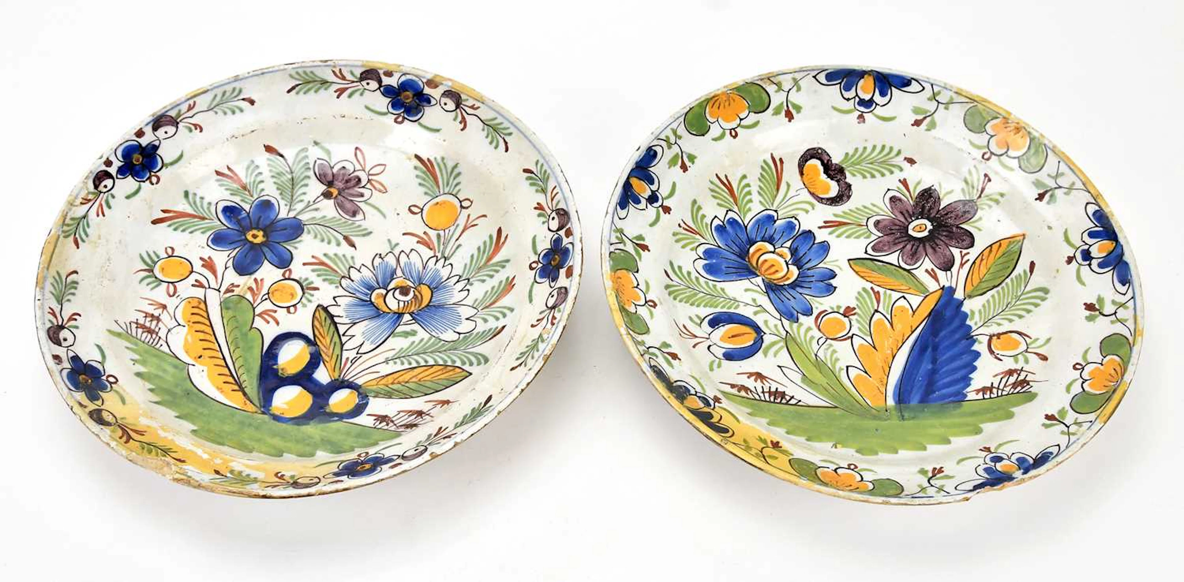 Two 18th century Delft polychrome tin glazed earthenware...