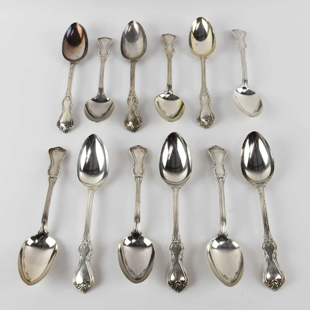 A set of twelve Victorian hallmarked silver dessert spoons