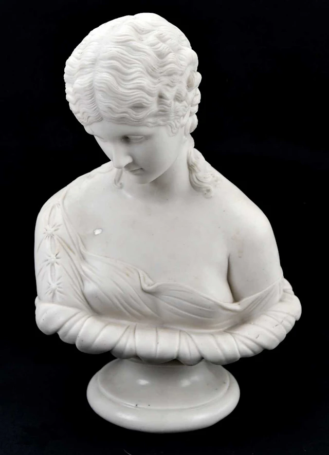 A 19th century Parian ware bust of a maiden wearing a flowing robe