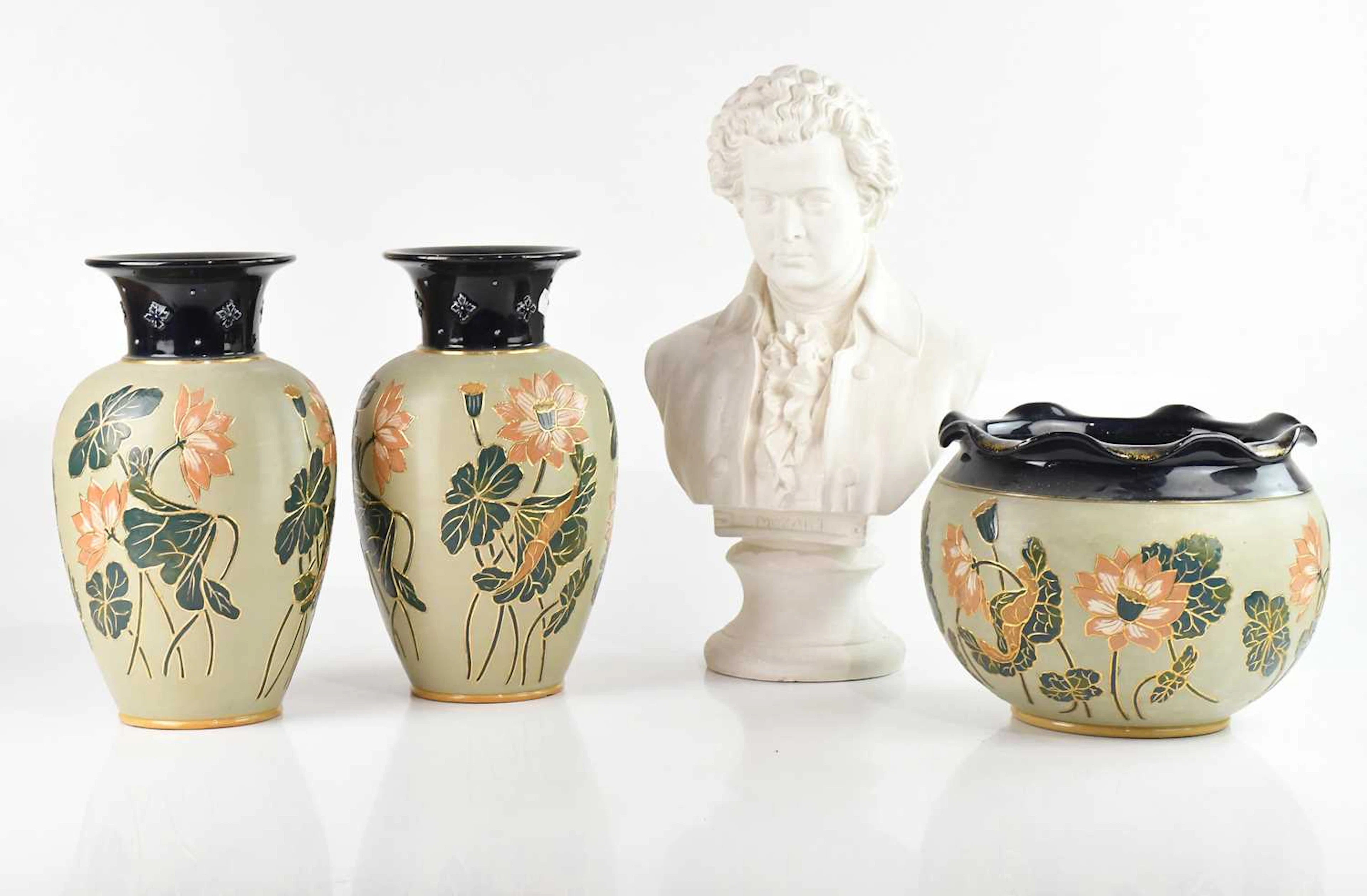 LANGLEY; a three piece garniture comprising a pair of vases