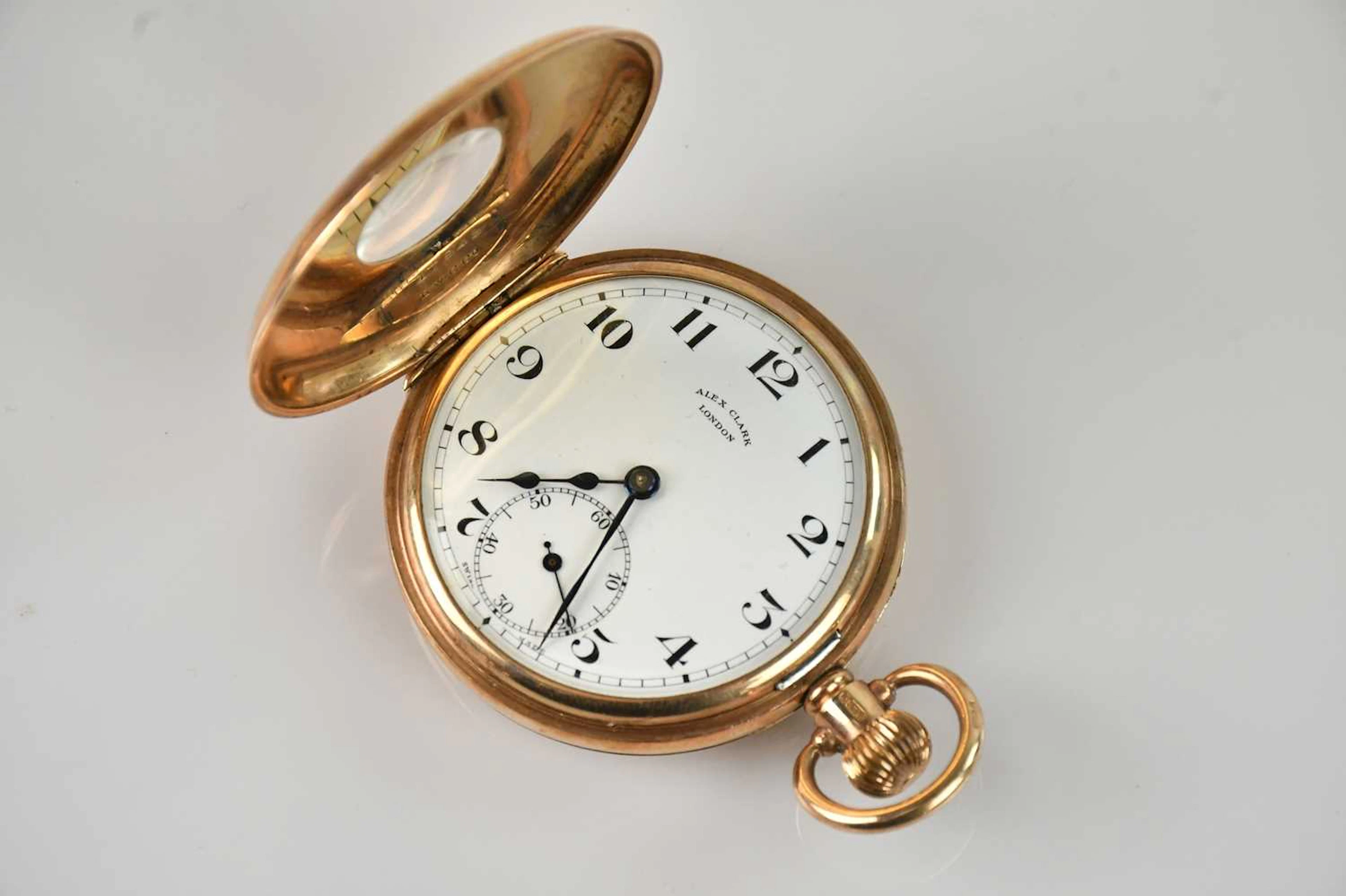A 9ct yellow gold crown wind half hunter pocket watch