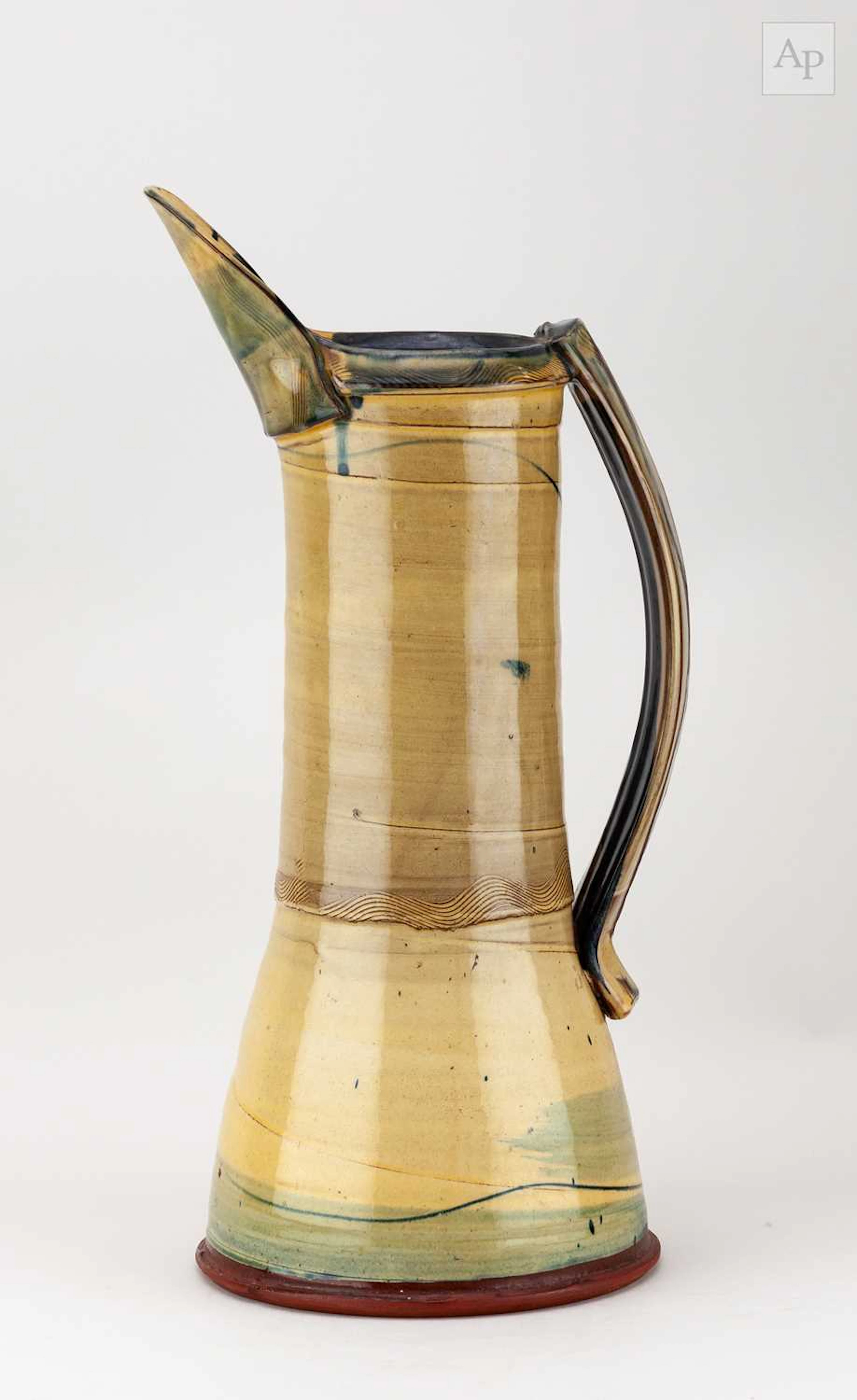RICHARD PHETHEAN (born 1953); a tall slipware jug with splayed base