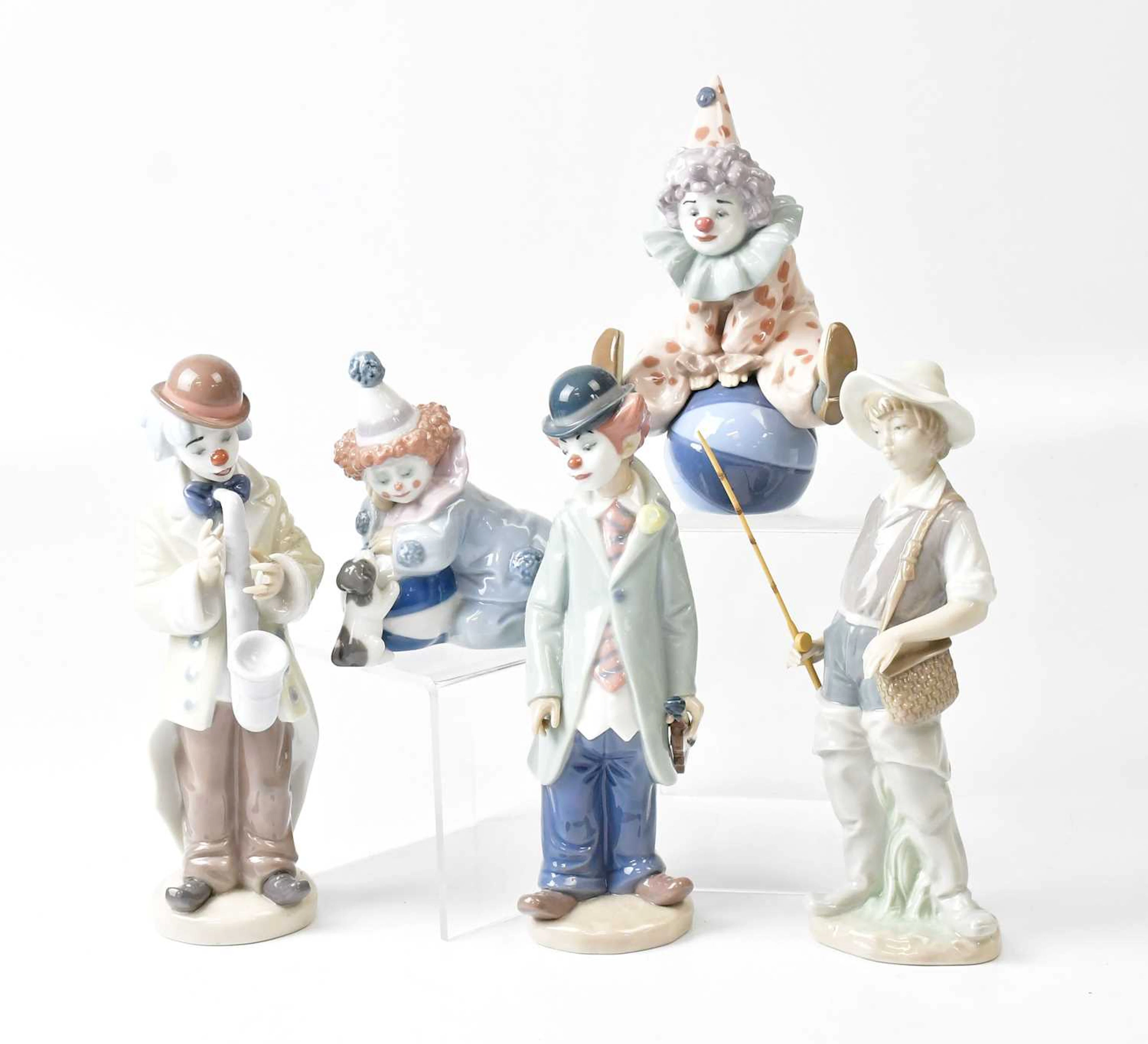 LLADRO; five figures comprising four clowns