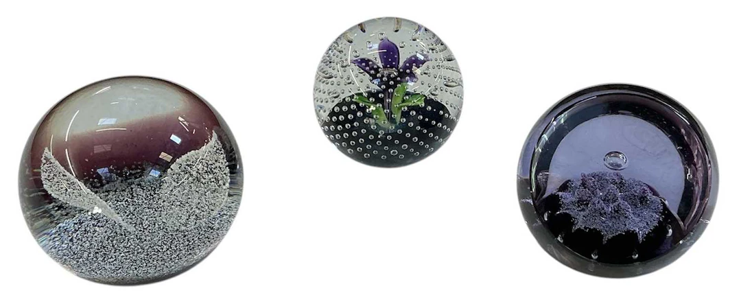 CAITHNESS; three limited edition glass paperweights comprising 'Zephyr'