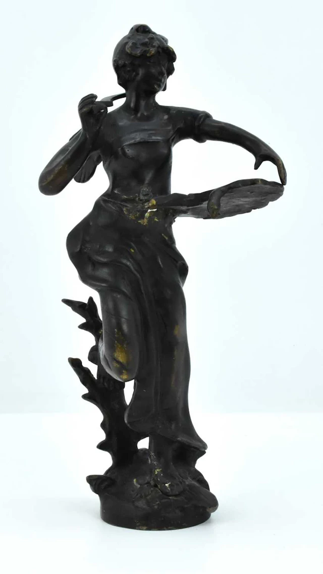 A late 19th/early 20th century patinated bronze figure...