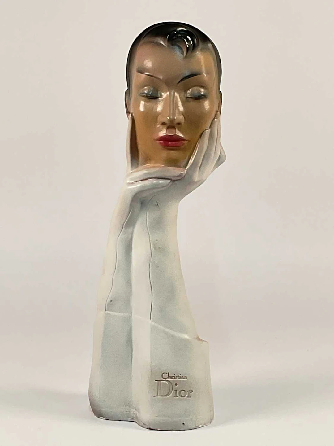 CHRISTIAN DIOR; a mid 20th century advertising shop...
