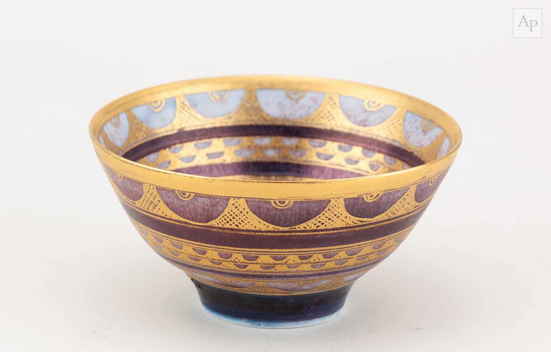 MARY RICH (1940-2022); a porcelain bowl with gilded bands...
