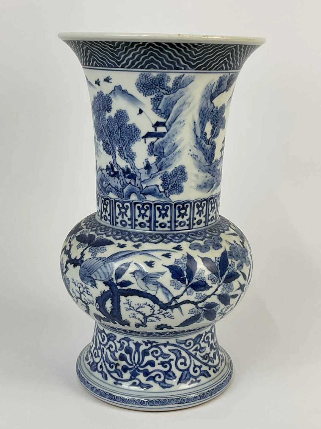 A Chinese blue and white porcelain flare neck vase...