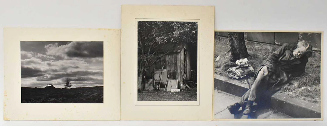 A collection of monochrome prints of the British landscape and people