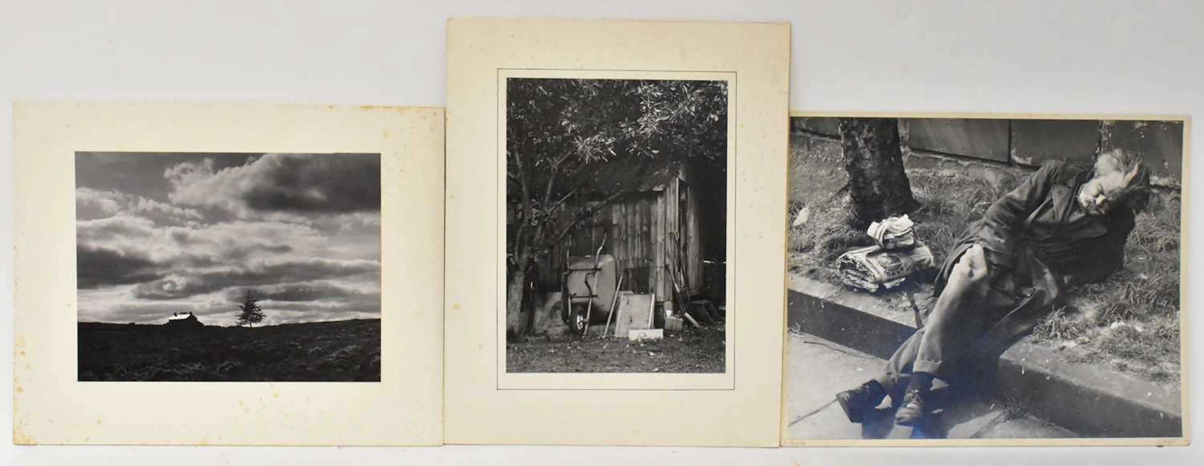 A collection of monochrome prints of the British landscape and people