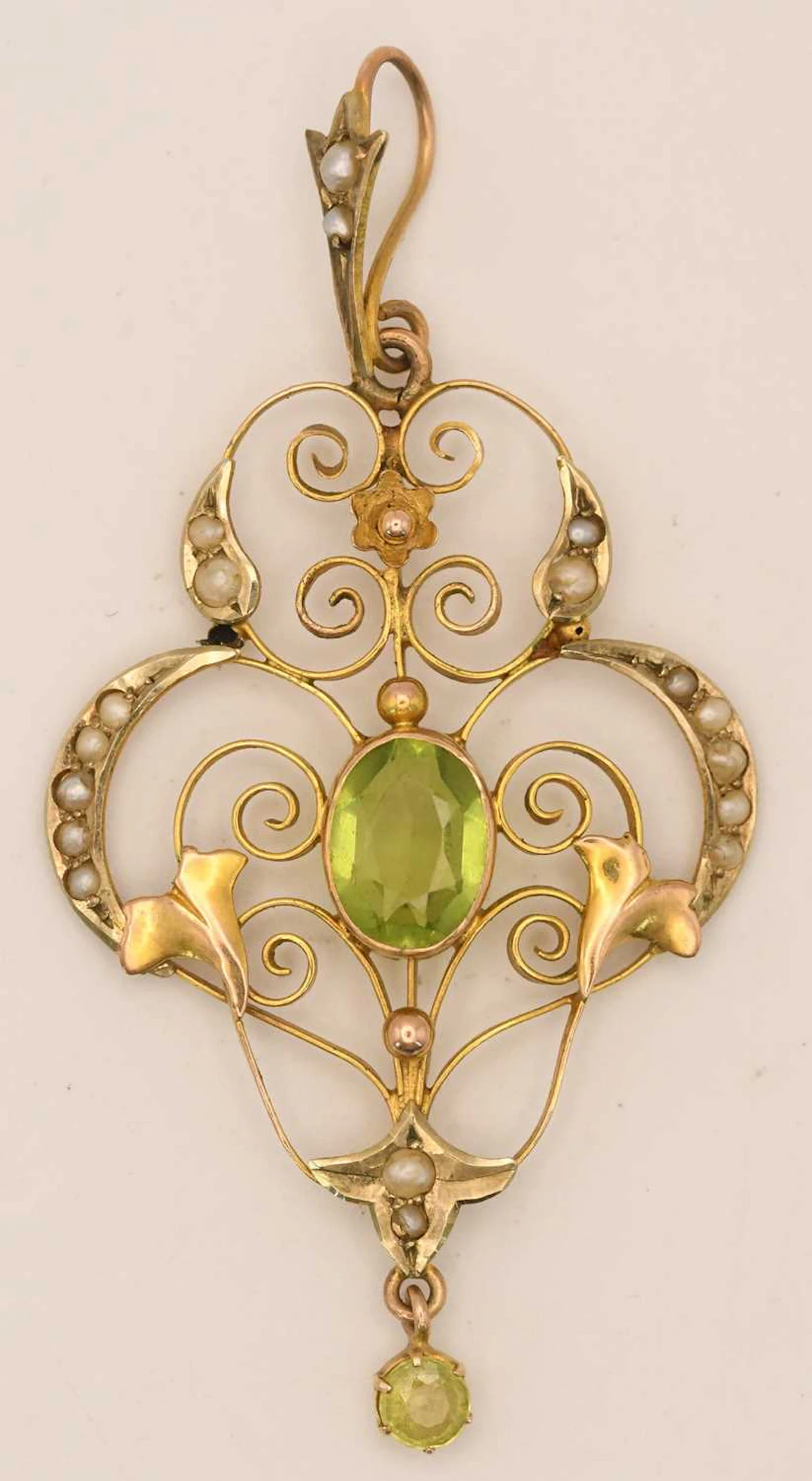 A yellow gold Edwardian Art Nouveau inspired pendant