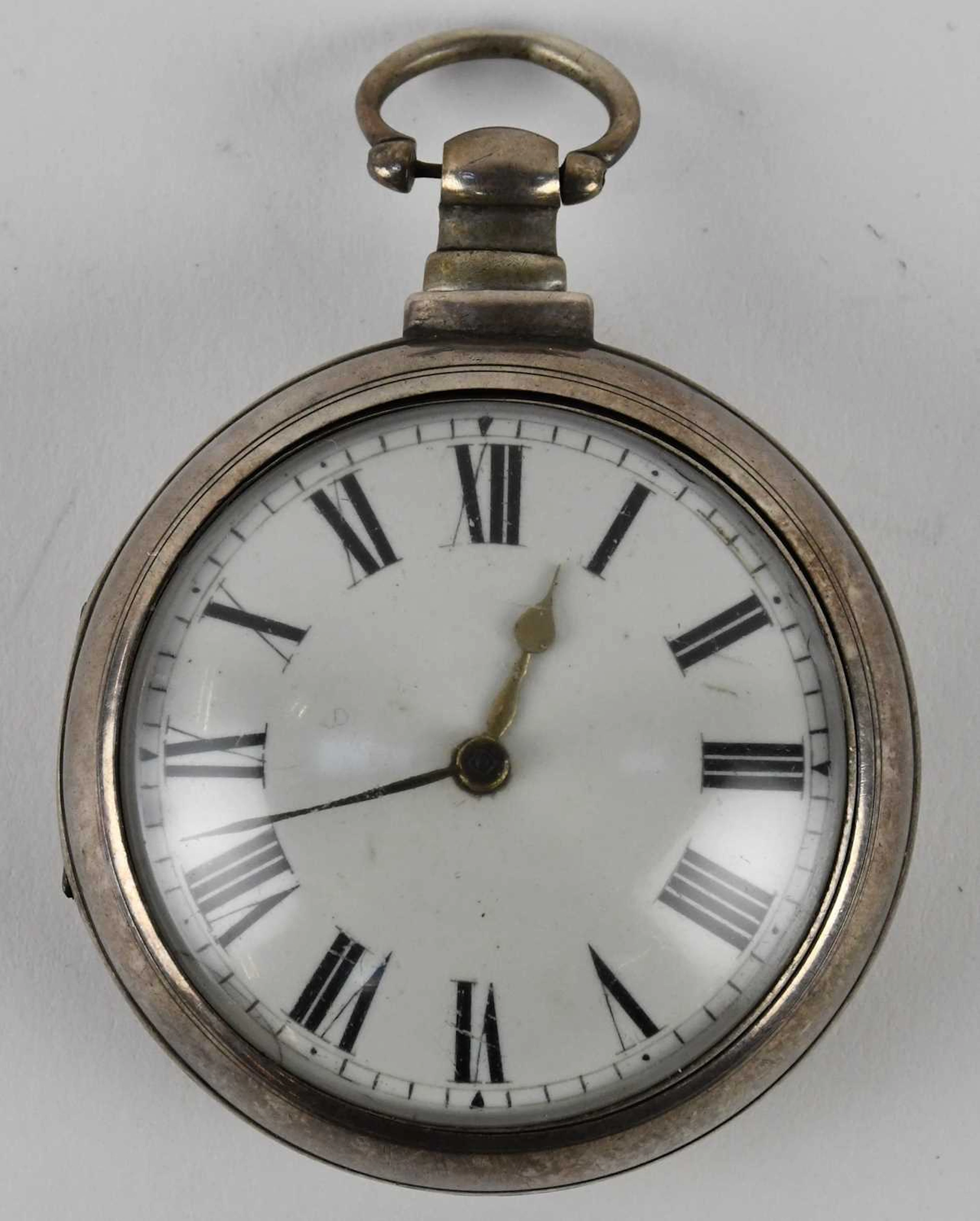 A George IV hallmarked silver pair cased open face key wind pocket watch