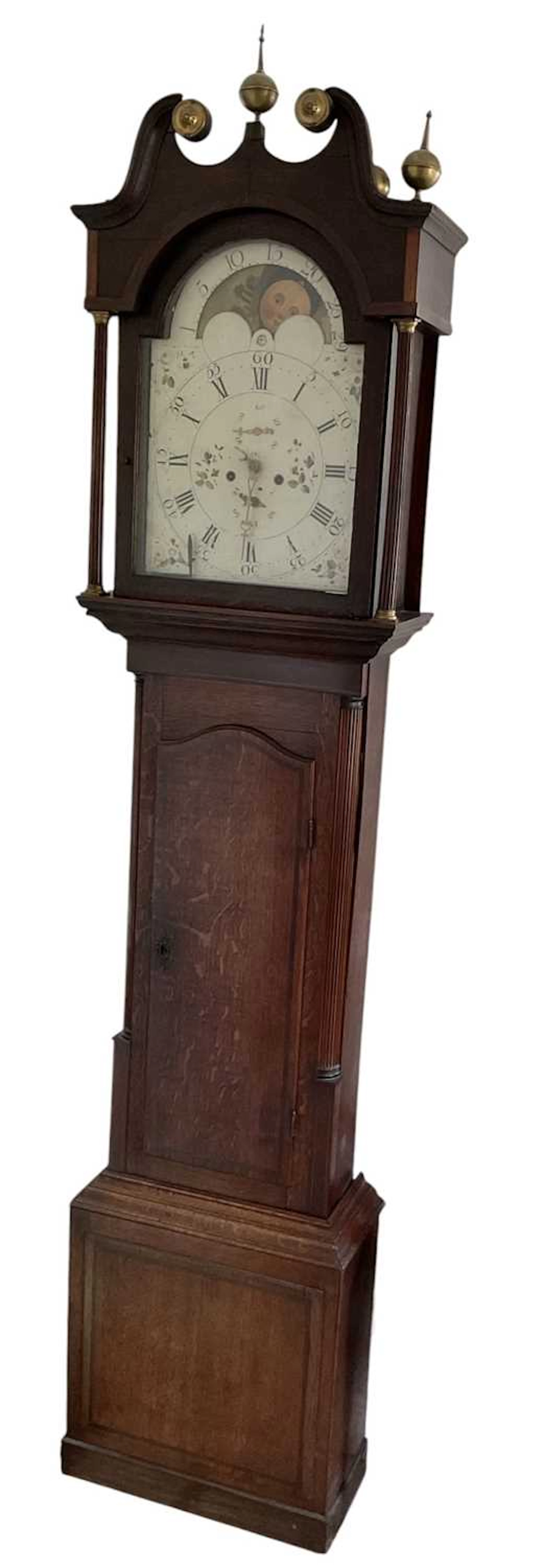 A 19th century oak cased eight day longcase clock