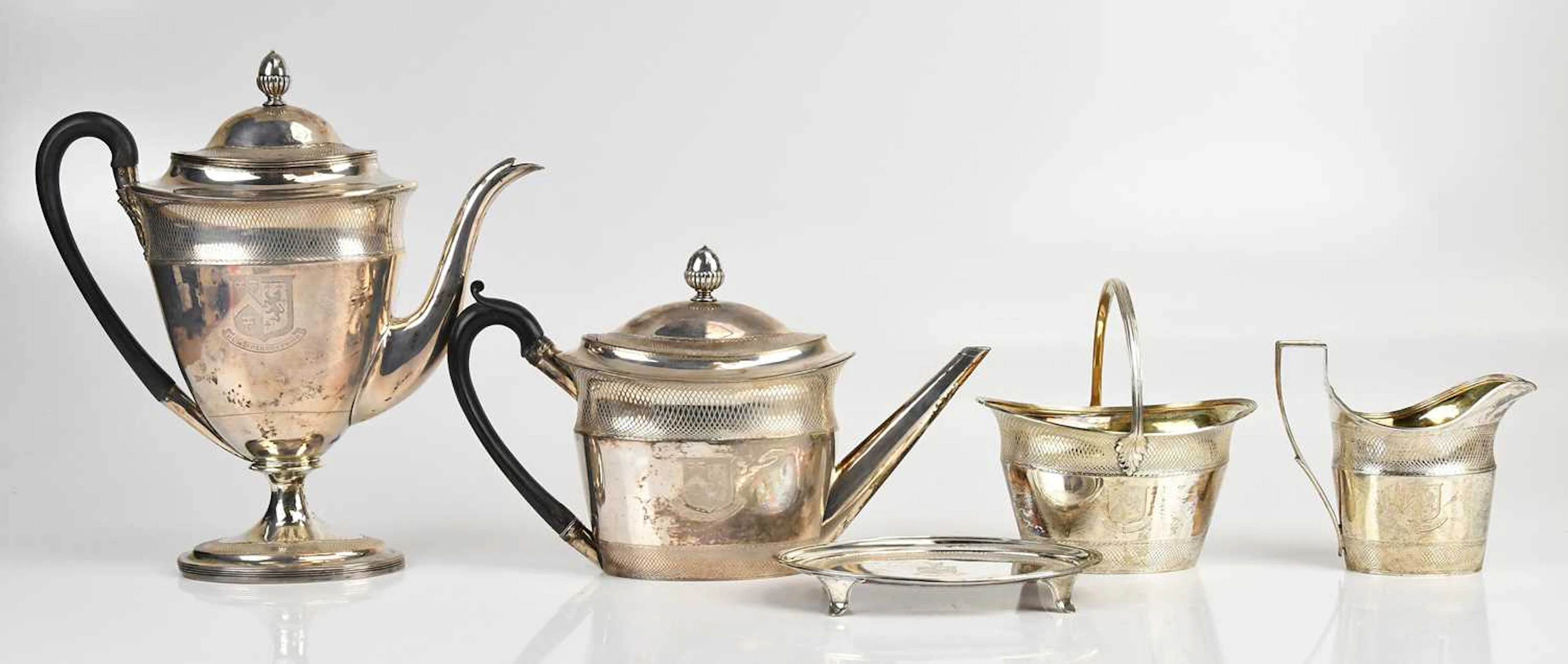 HENRY CHAWNER & JOHN EAMES; a George III hallmarked silver teapot and stand