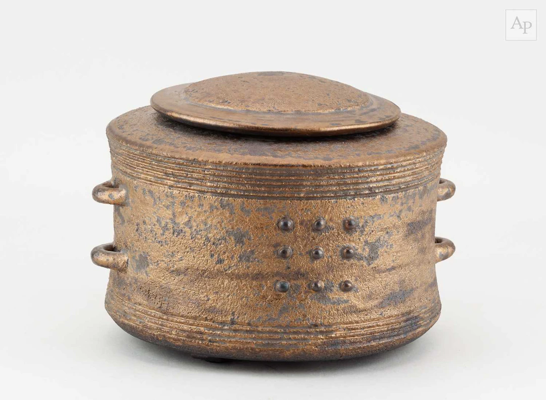 JASON WASON (born 1946); a lugged stoneware vessel and...