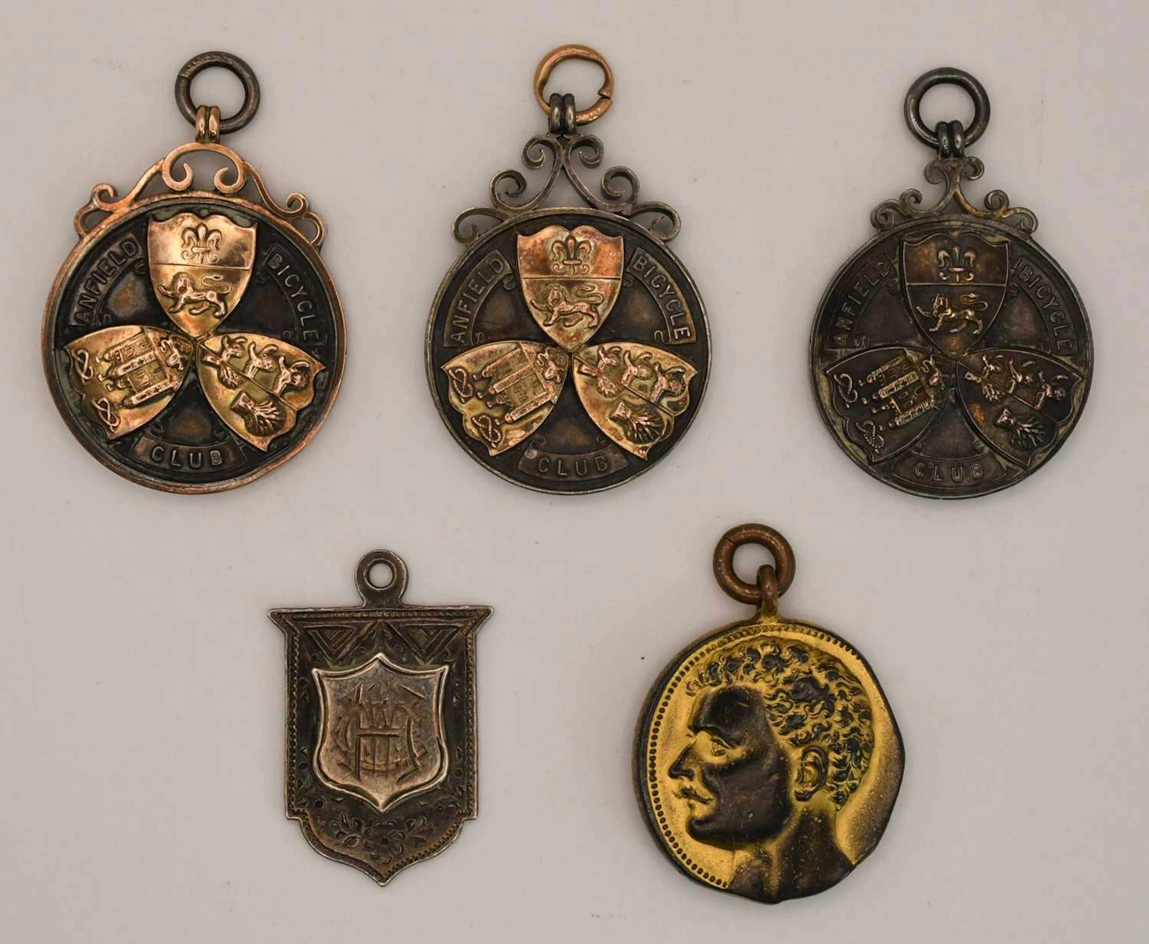 Four silver prize fob medals